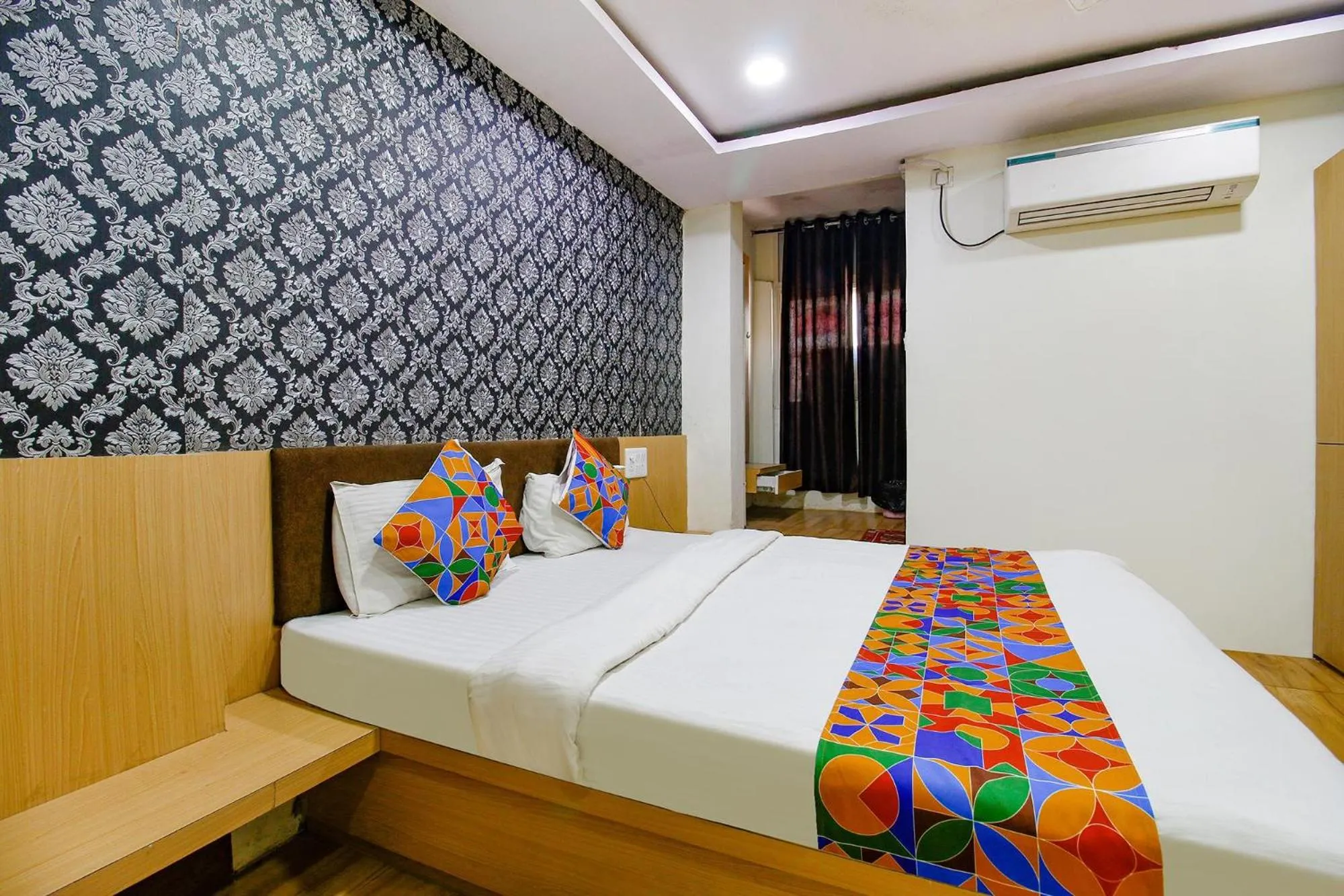 Bed in FabHotel Surbhi