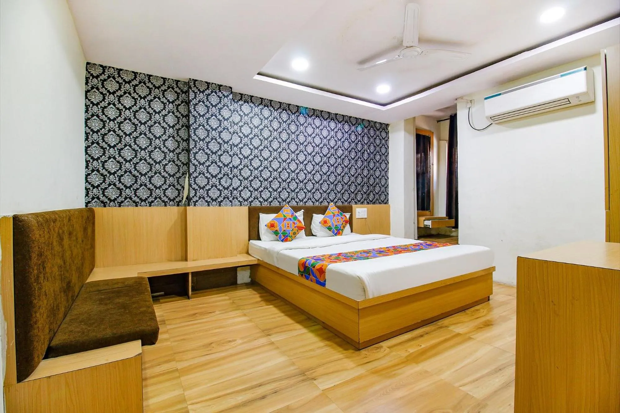 Bed in FabHotel Surbhi