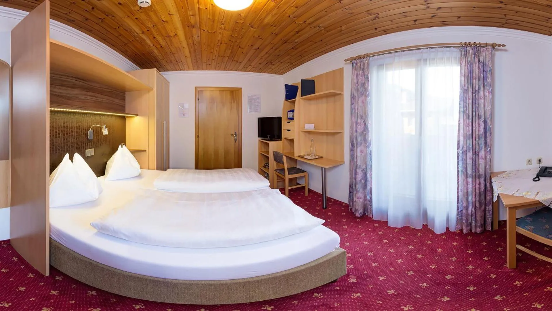 Bed in Hotel-Pension Egger