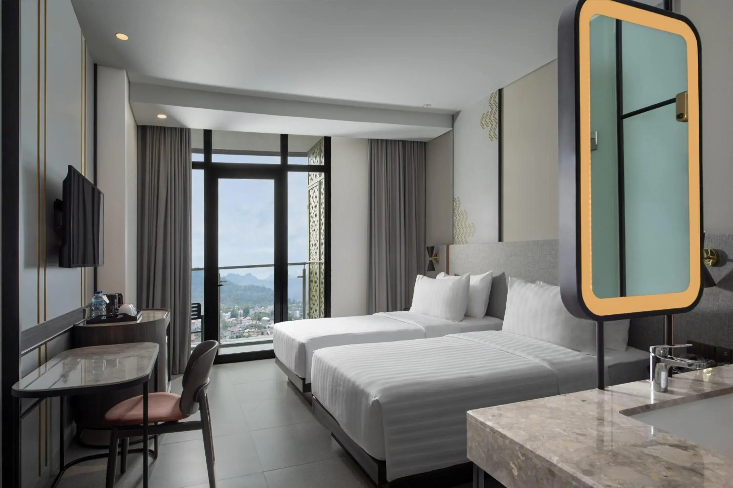 Deluxe Twin Room in Hotel Santika Premiere Padang Deluxe Twin Room in Hotel Santika Premiere Padang