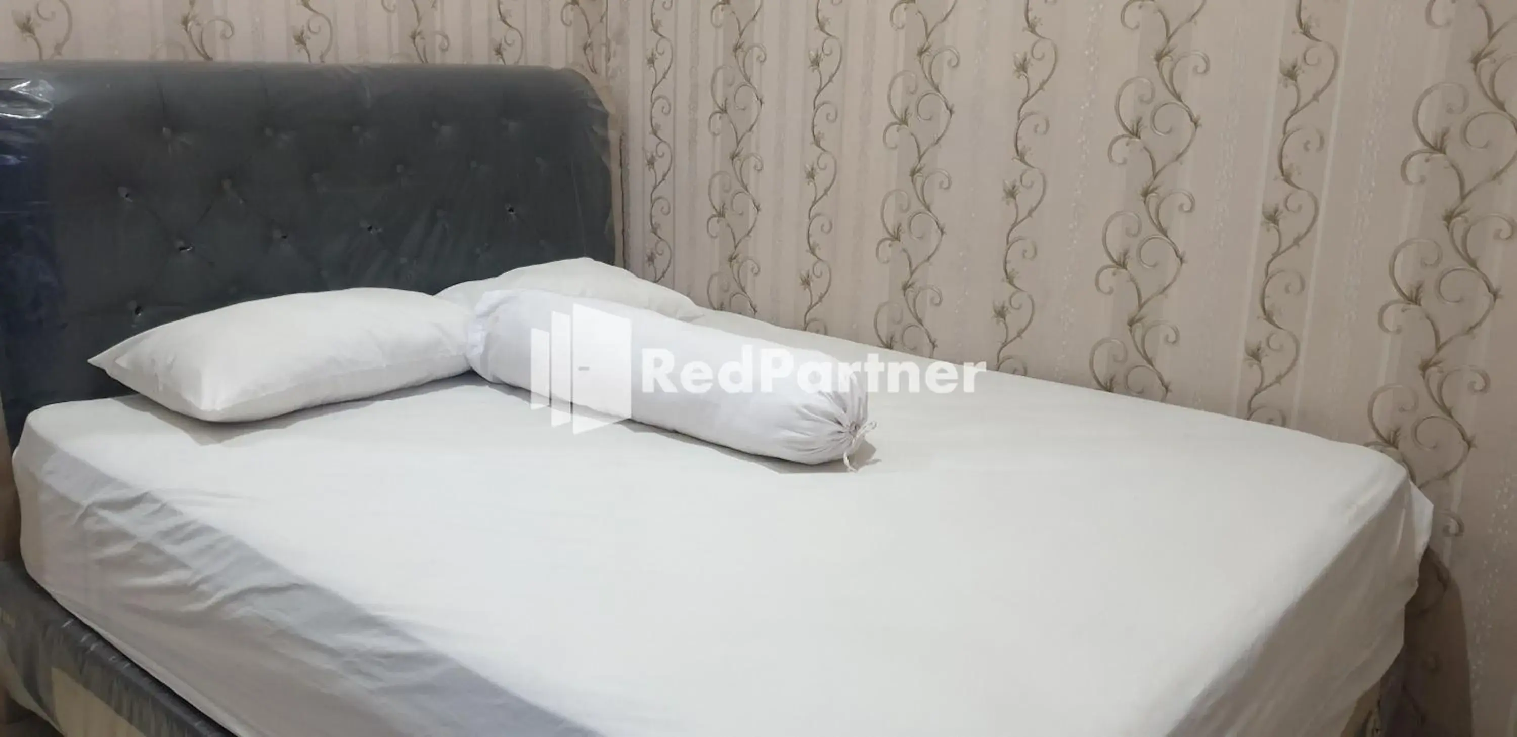 Bed in Homestay MM Syariah RedPartner Bed in Homestay MM Syariah RedPartner