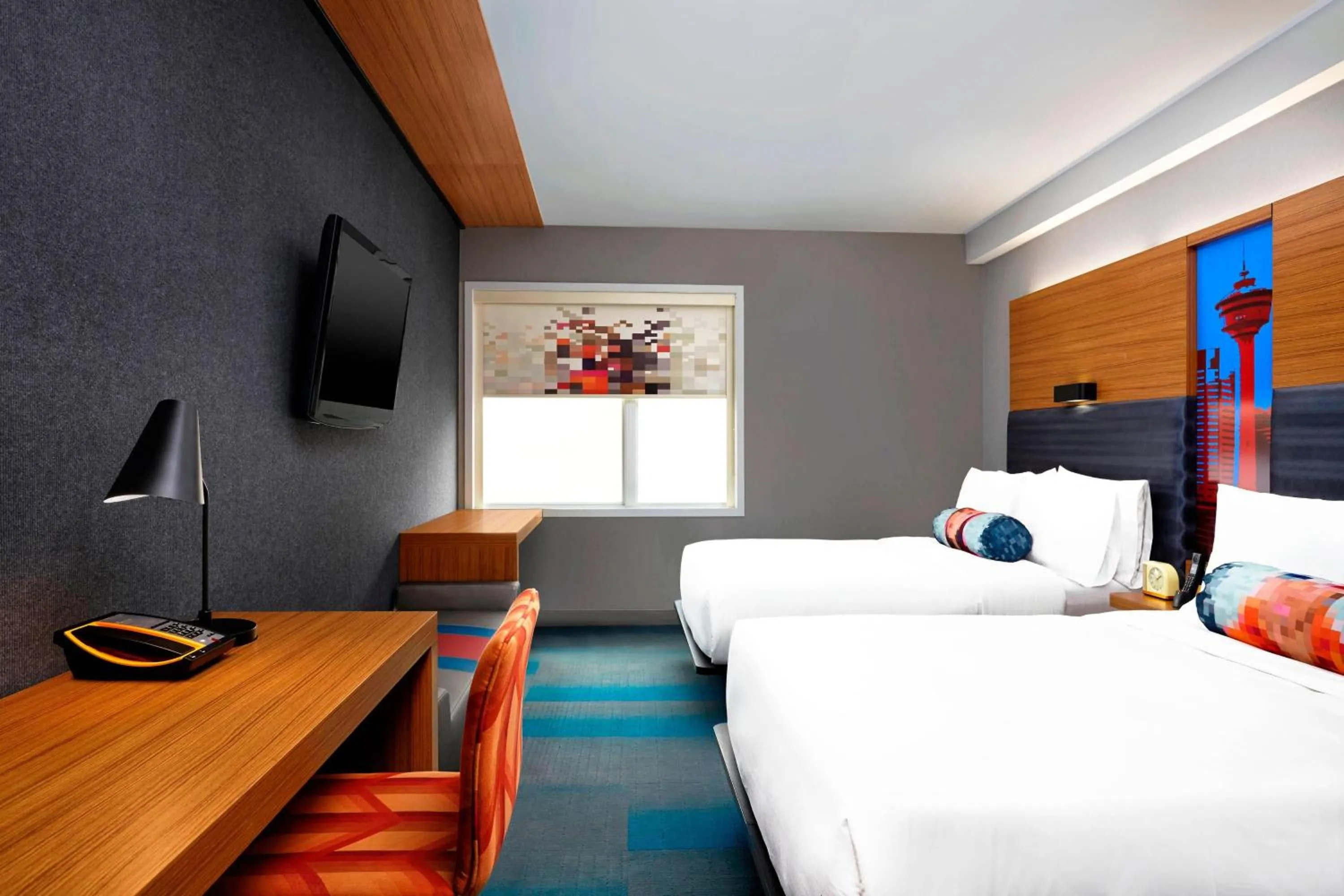 Photo of the whole room, Bed in Aloft Hotel Calgary University