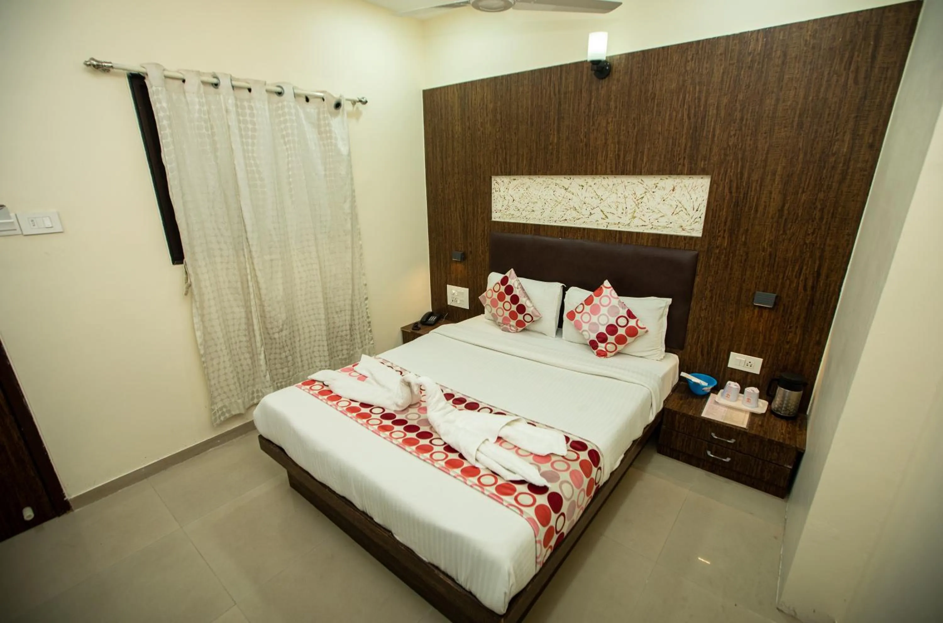 Bed in Hotel J D Residency