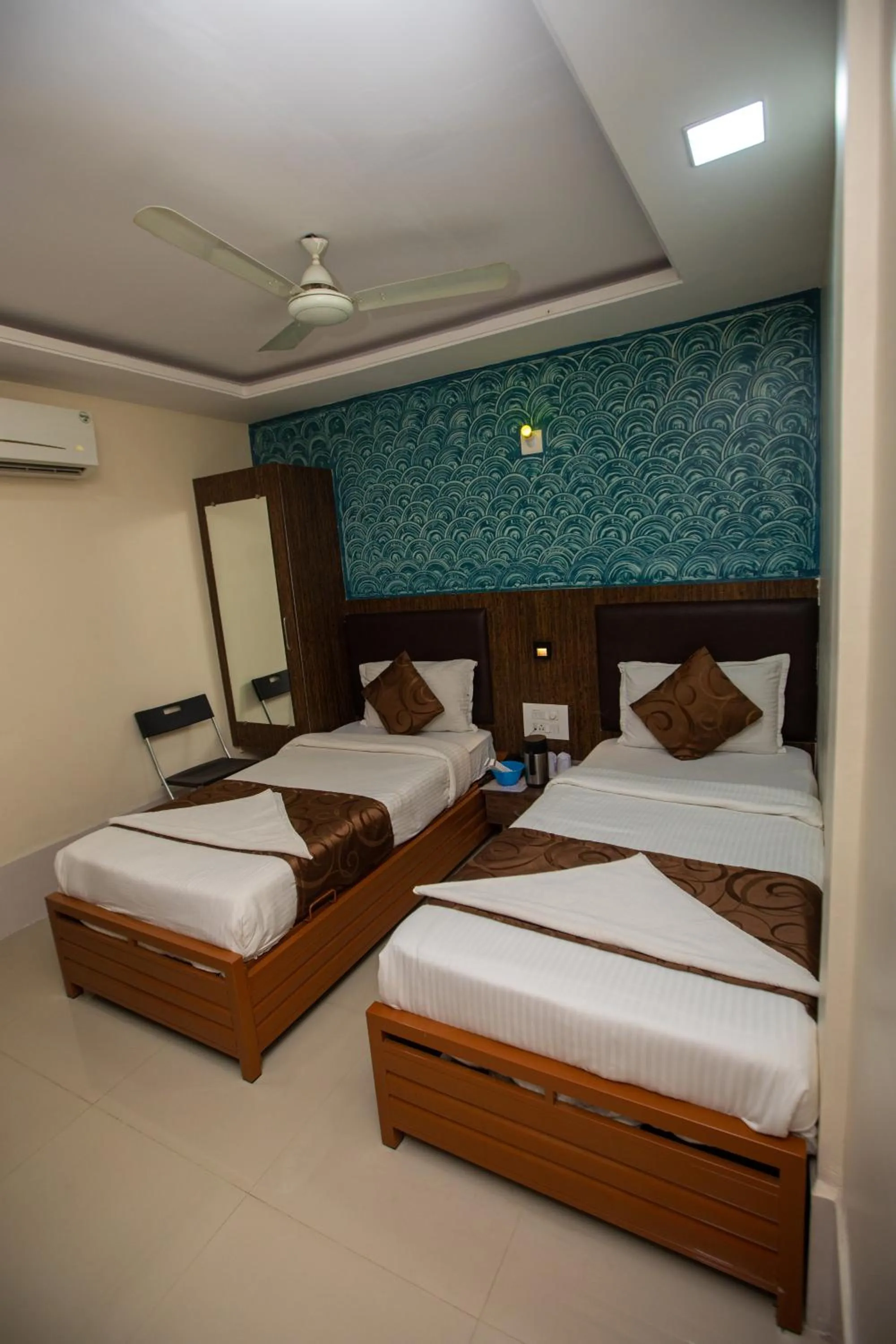 Bed in Hotel J D Residency