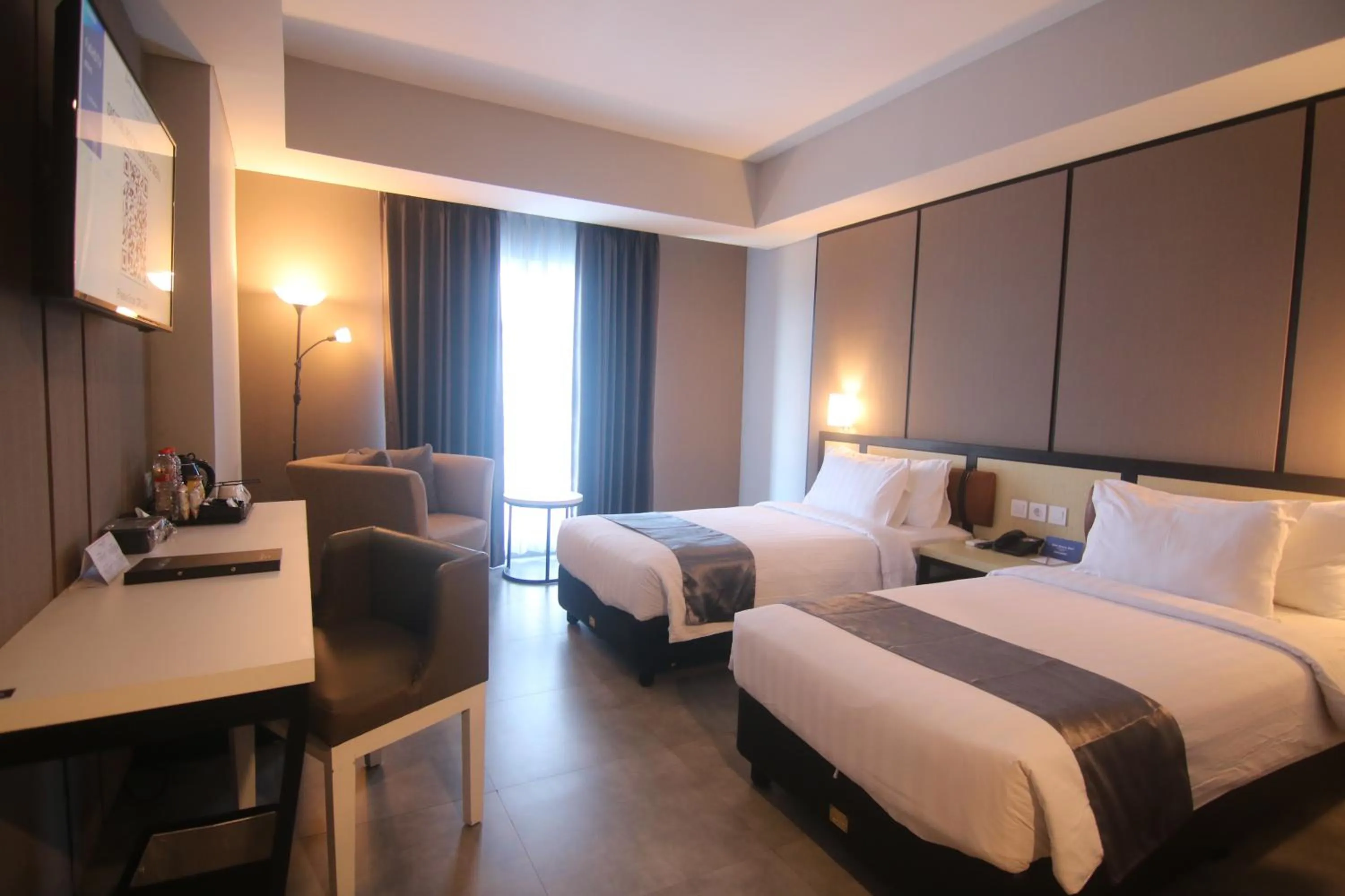 Bed in BeSS Mansion Hotel Surabaya