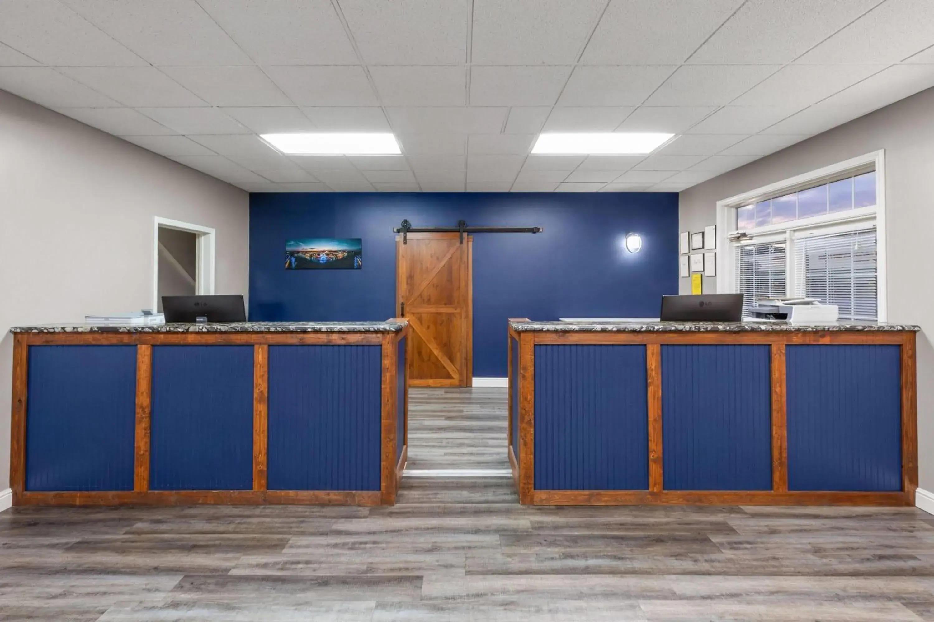 Lobby or reception in Angel Inn Near IMAX, a Travelodge by Wyndham Lobby or reception in Angel Inn Near IMAX, a Travelodge by Wyndham