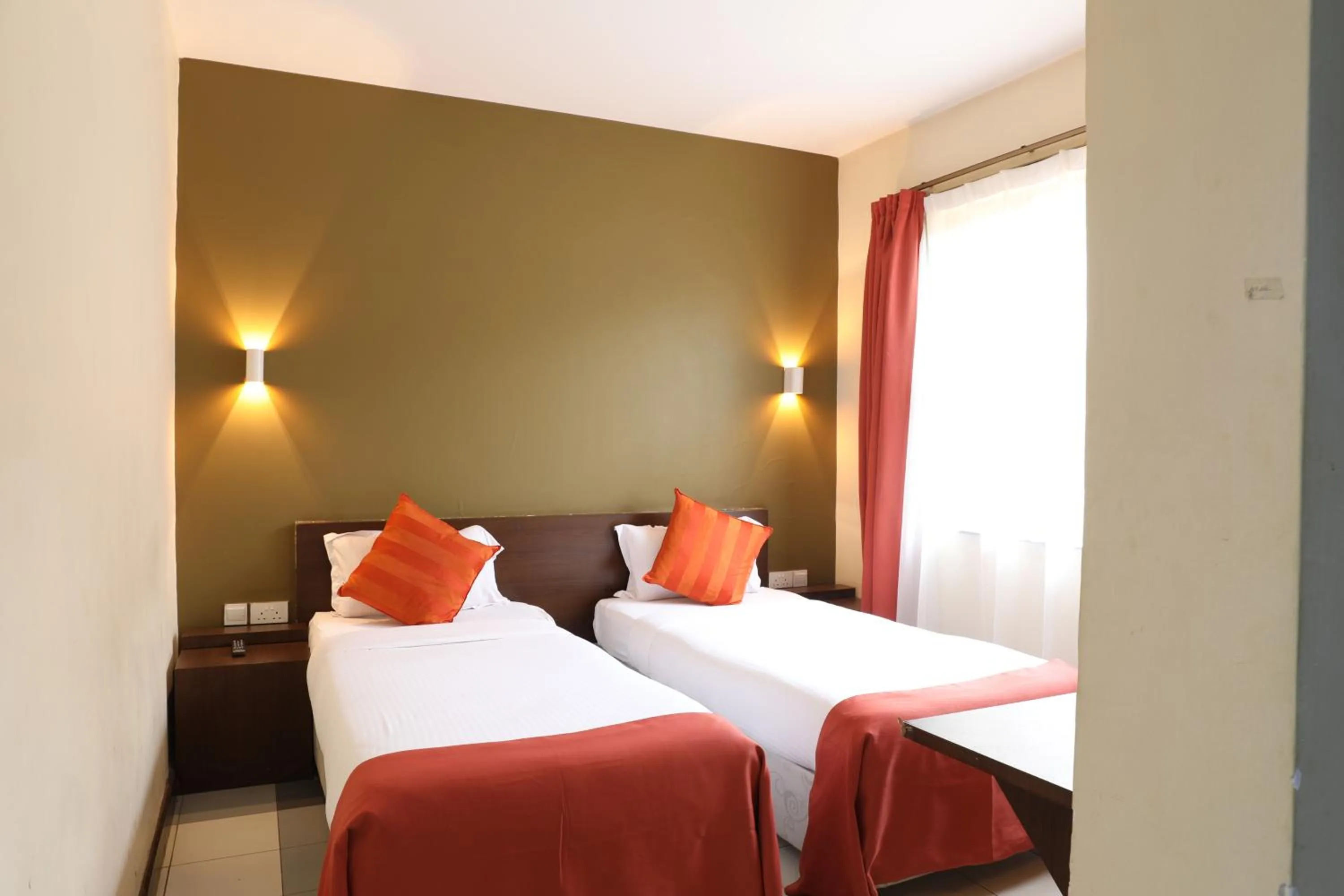 Bed in Qaribu Inn Boutique Hotel Nairobi