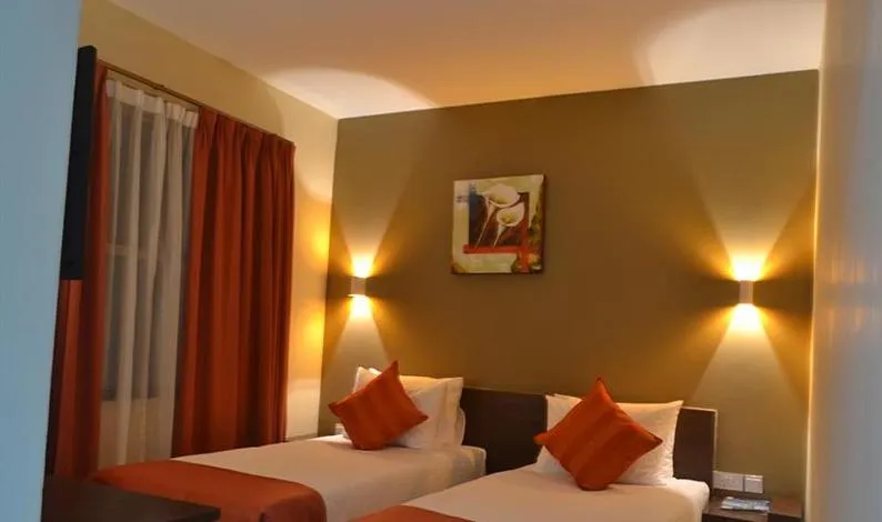 Bed in Qaribu Inn Boutique Hotel Nairobi