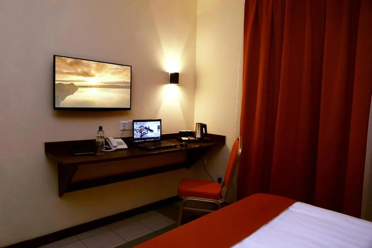 TV and multimedia, Bed in Qaribu Inn Boutique Hotel Nairobi