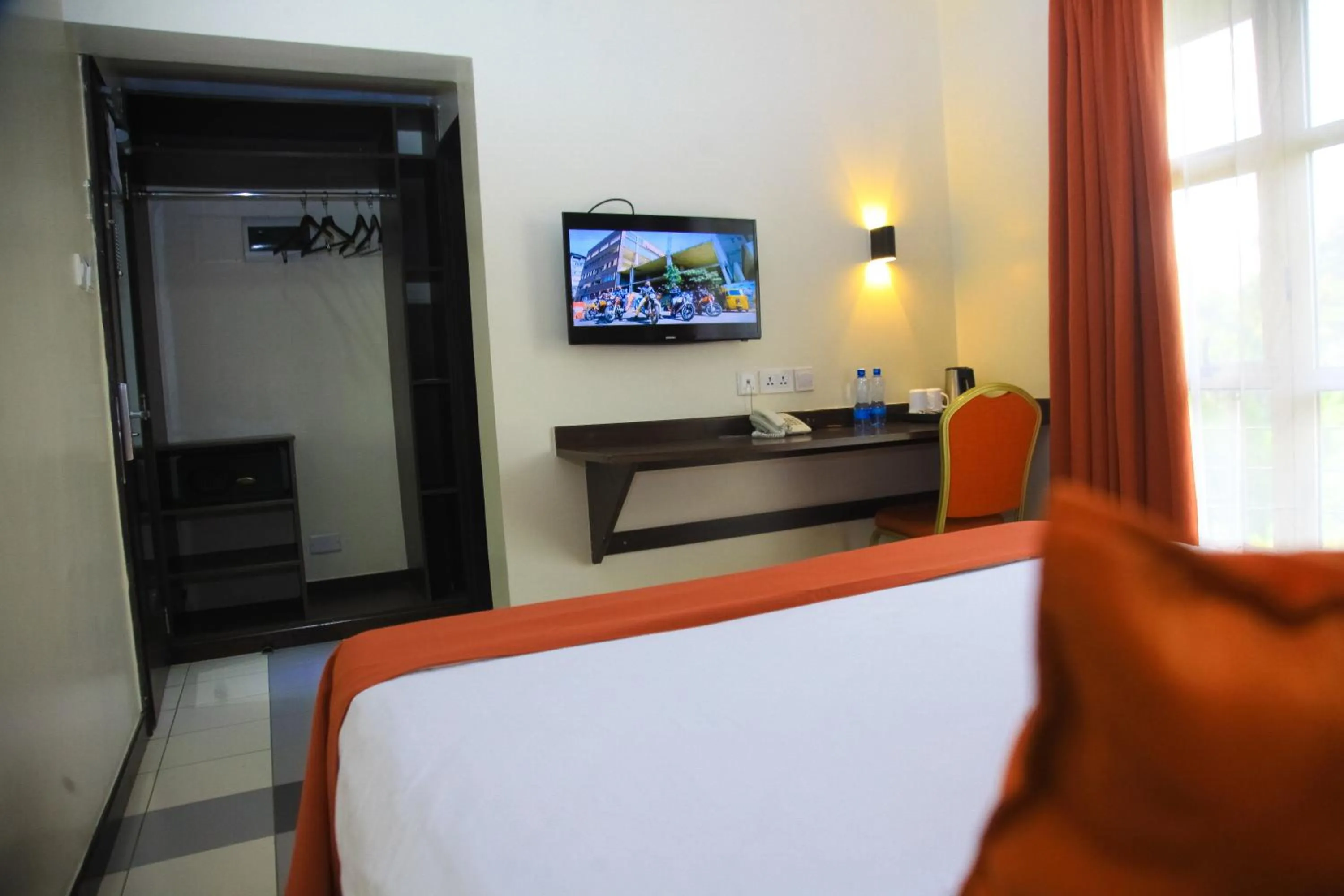 TV and multimedia, Bed in Qaribu Inn Boutique Hotel Nairobi