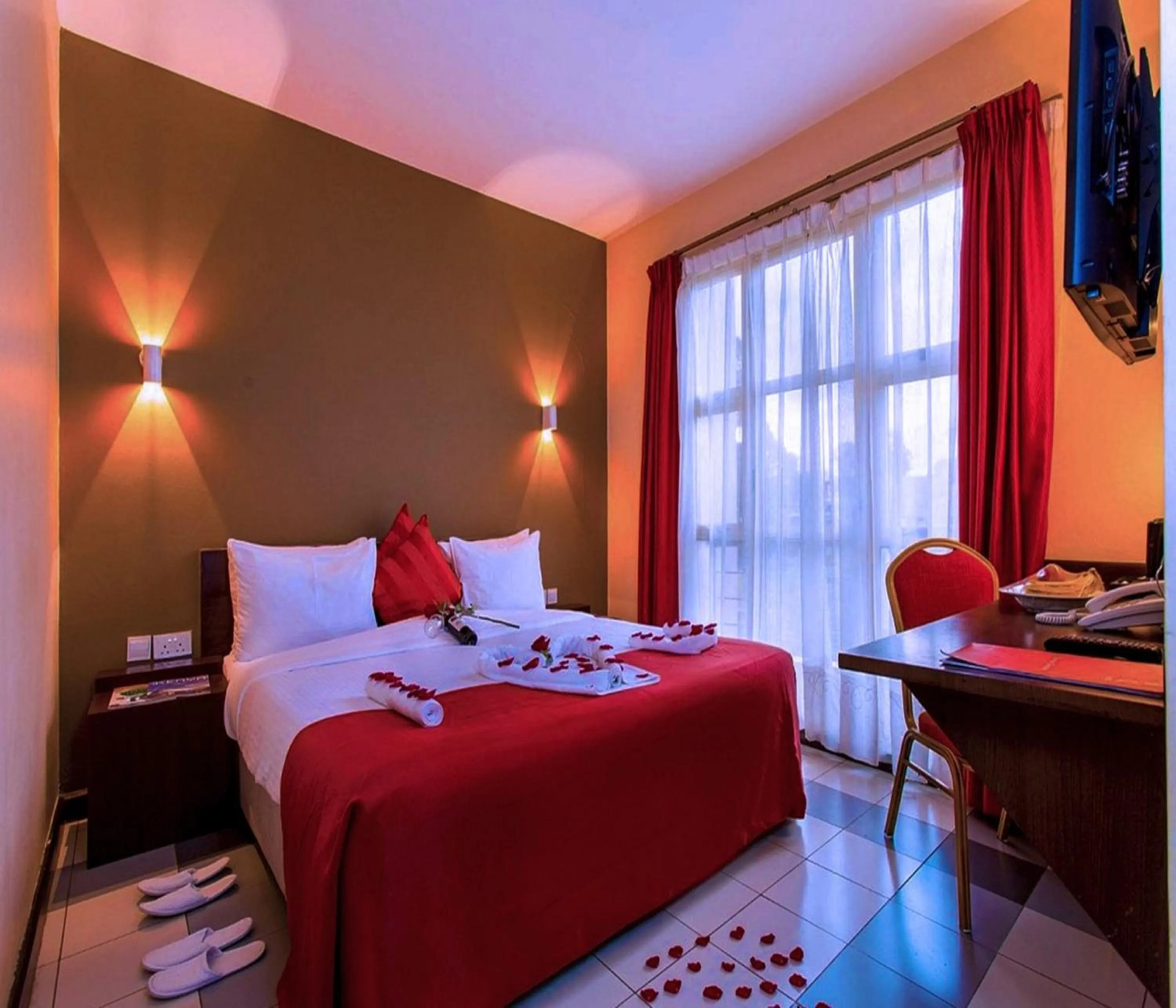 Bed in Qaribu Inn Boutique Hotel Nairobi