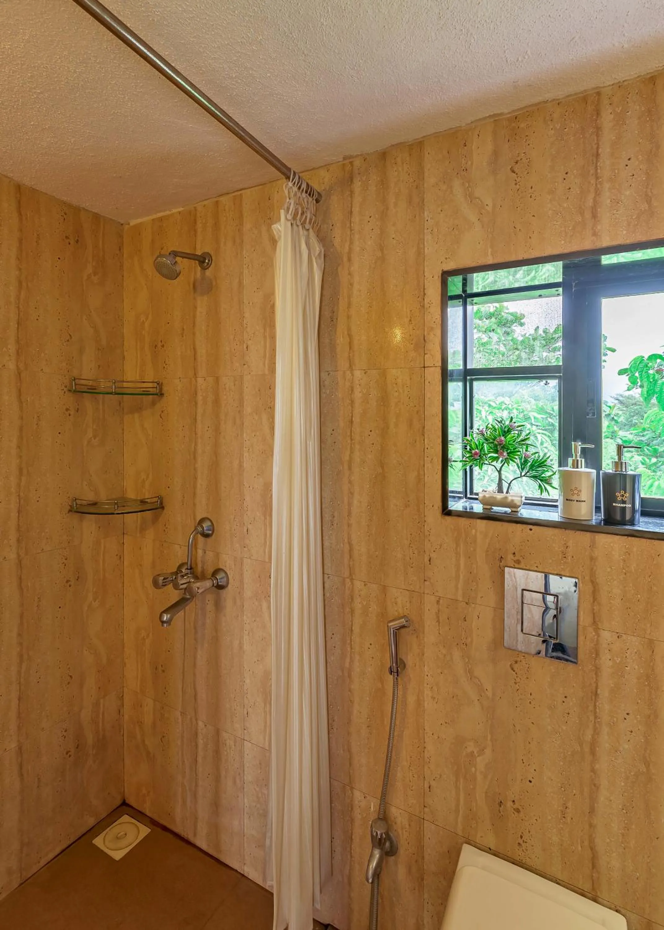 Shower in SaffronStays Le Soil, Igatpuri - pet-friendly villa with viewing deck for panoramic views