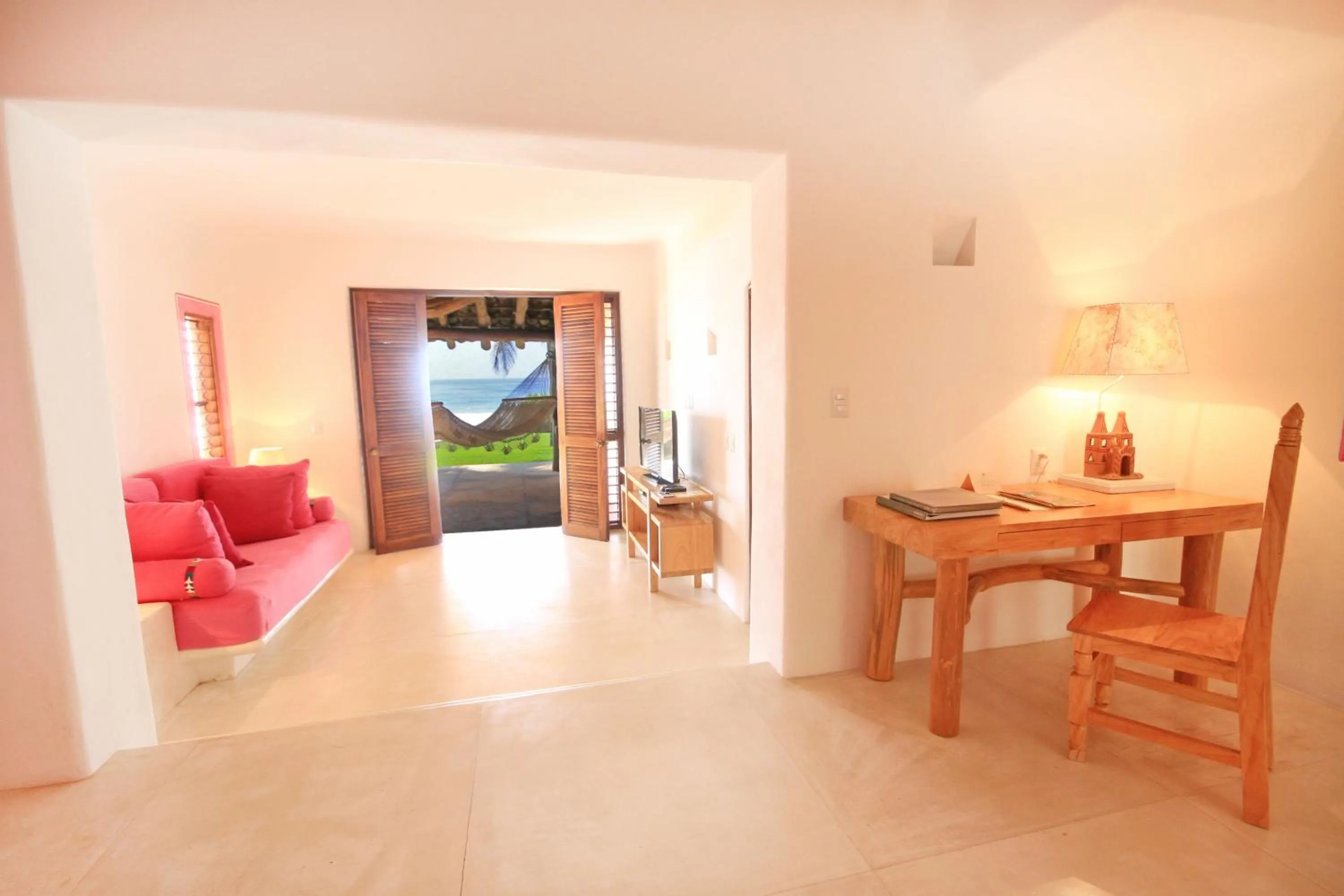 Communal lounge/ TV room in Las Alamandas