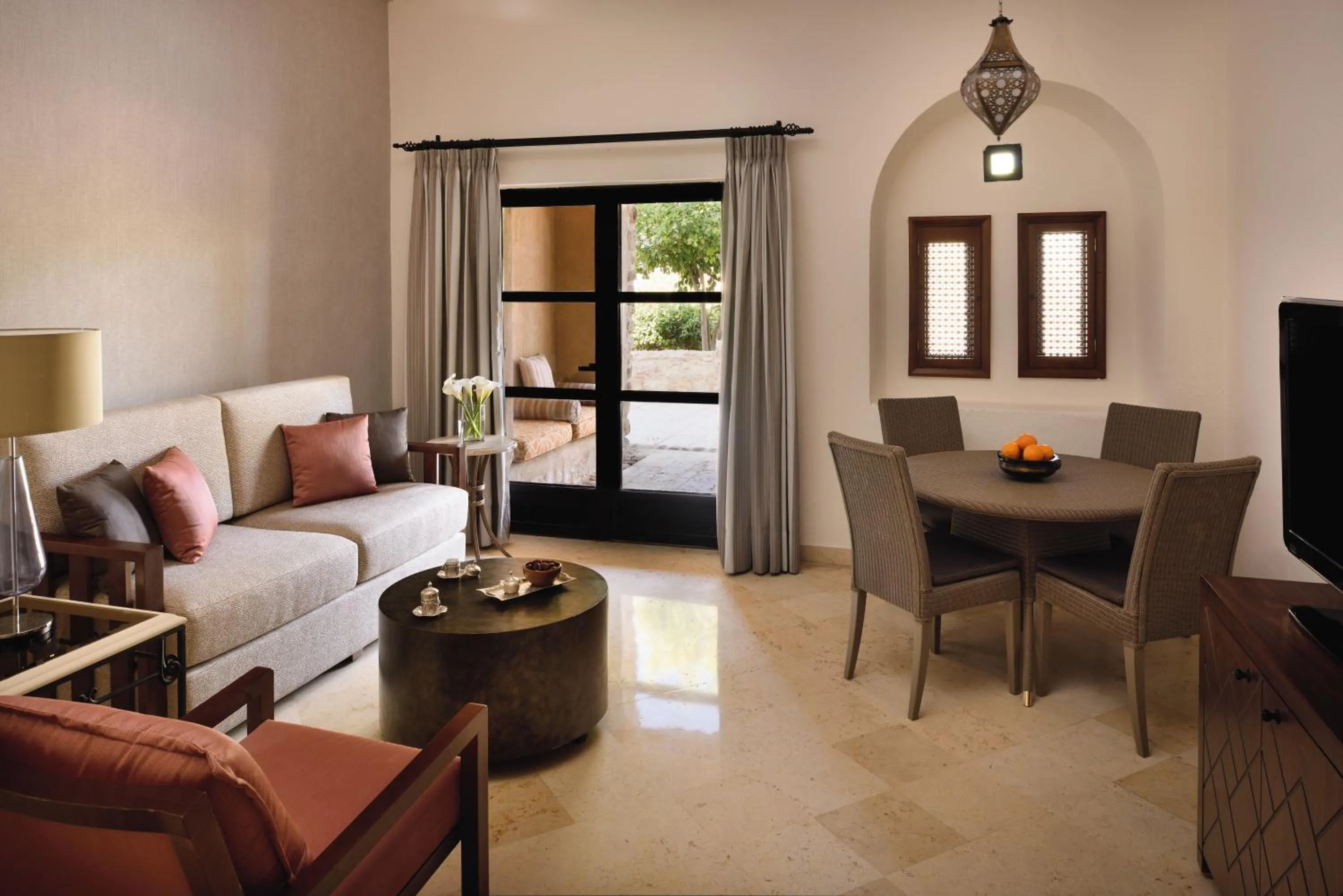 Living room, Bed in Mövenpick Resort & Spa Dead Sea