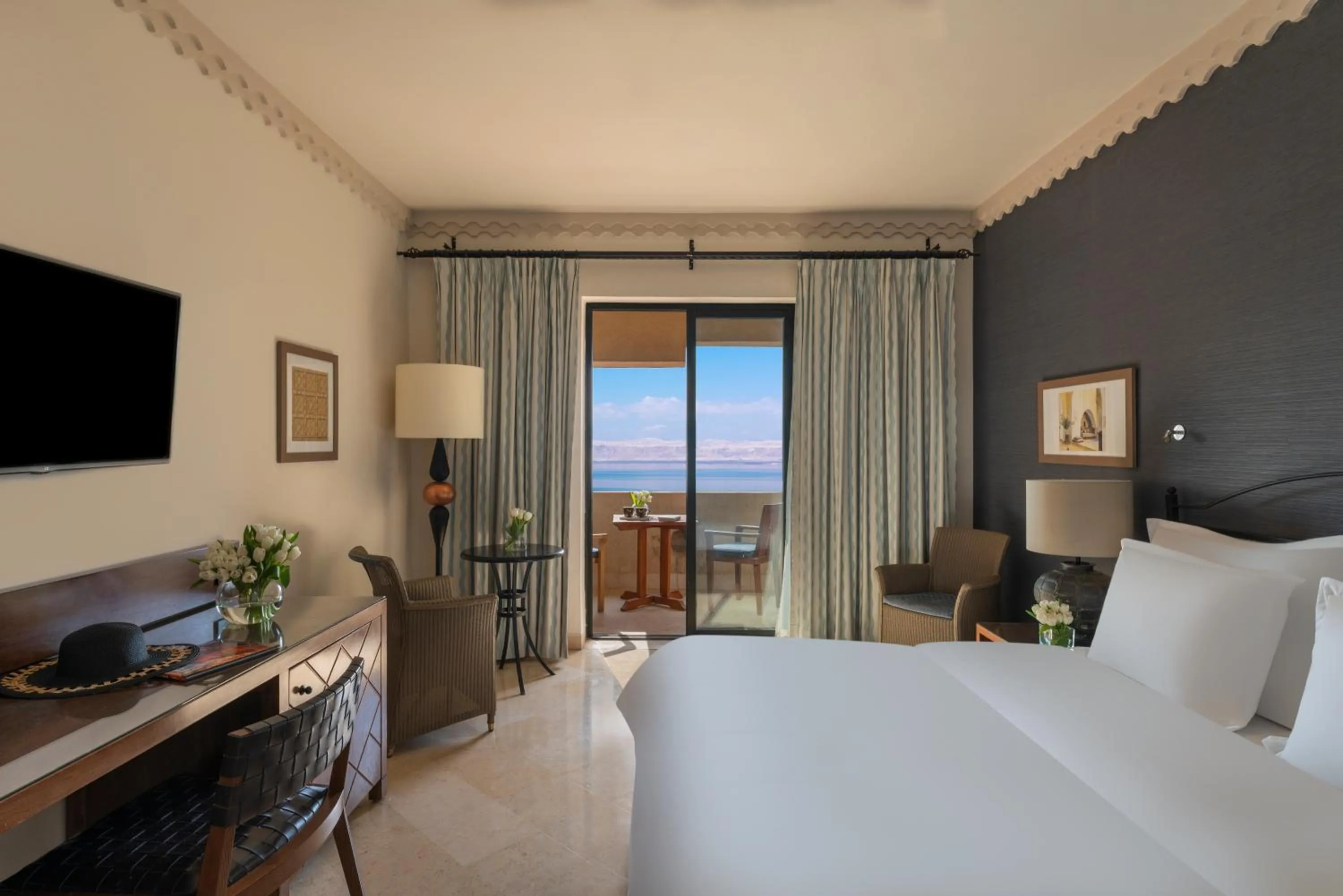 Balcony/Terrace, Bed in Mövenpick Resort & Spa Dead Sea