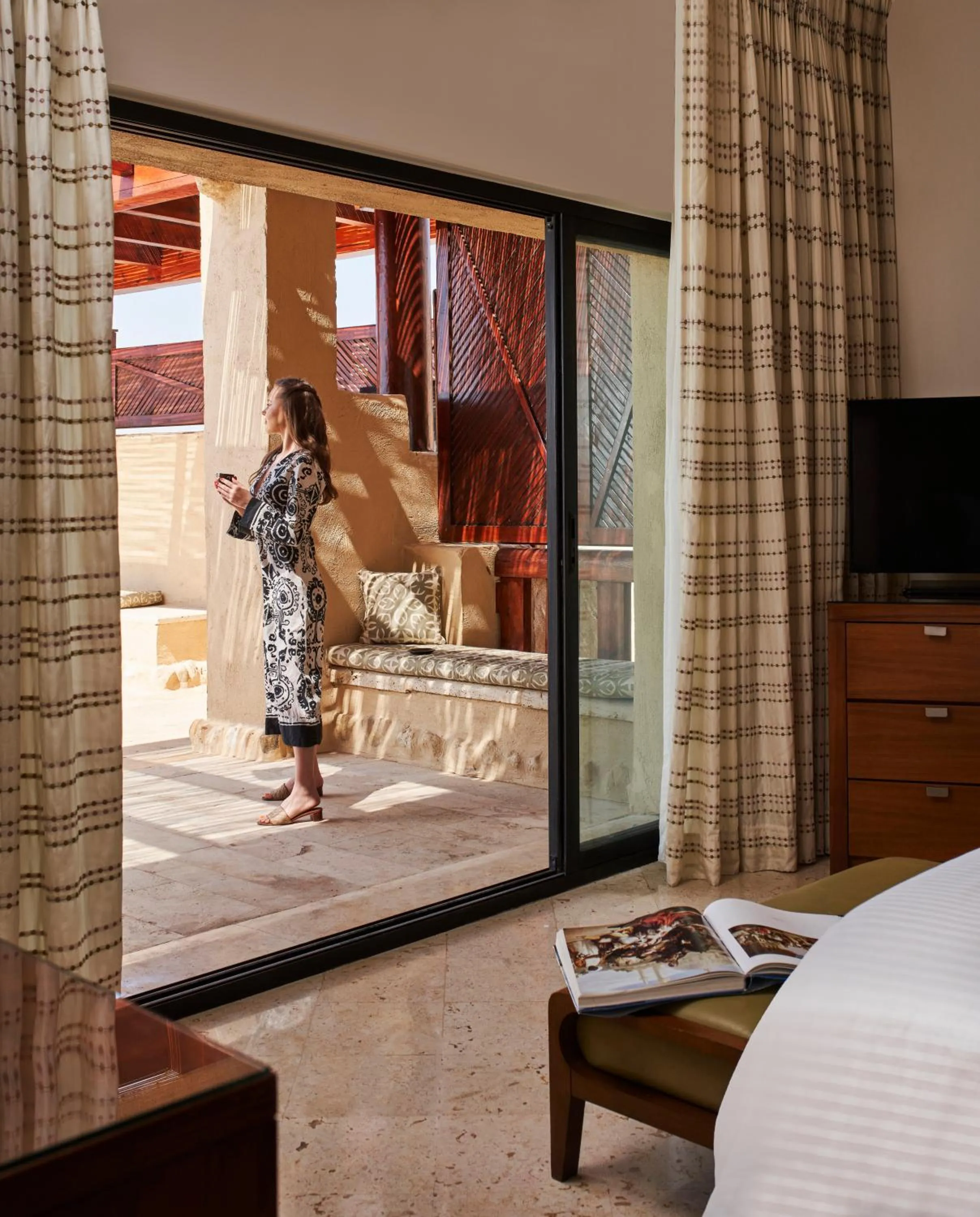 Balcony/Terrace, Bed in Mövenpick Resort & Spa Dead Sea