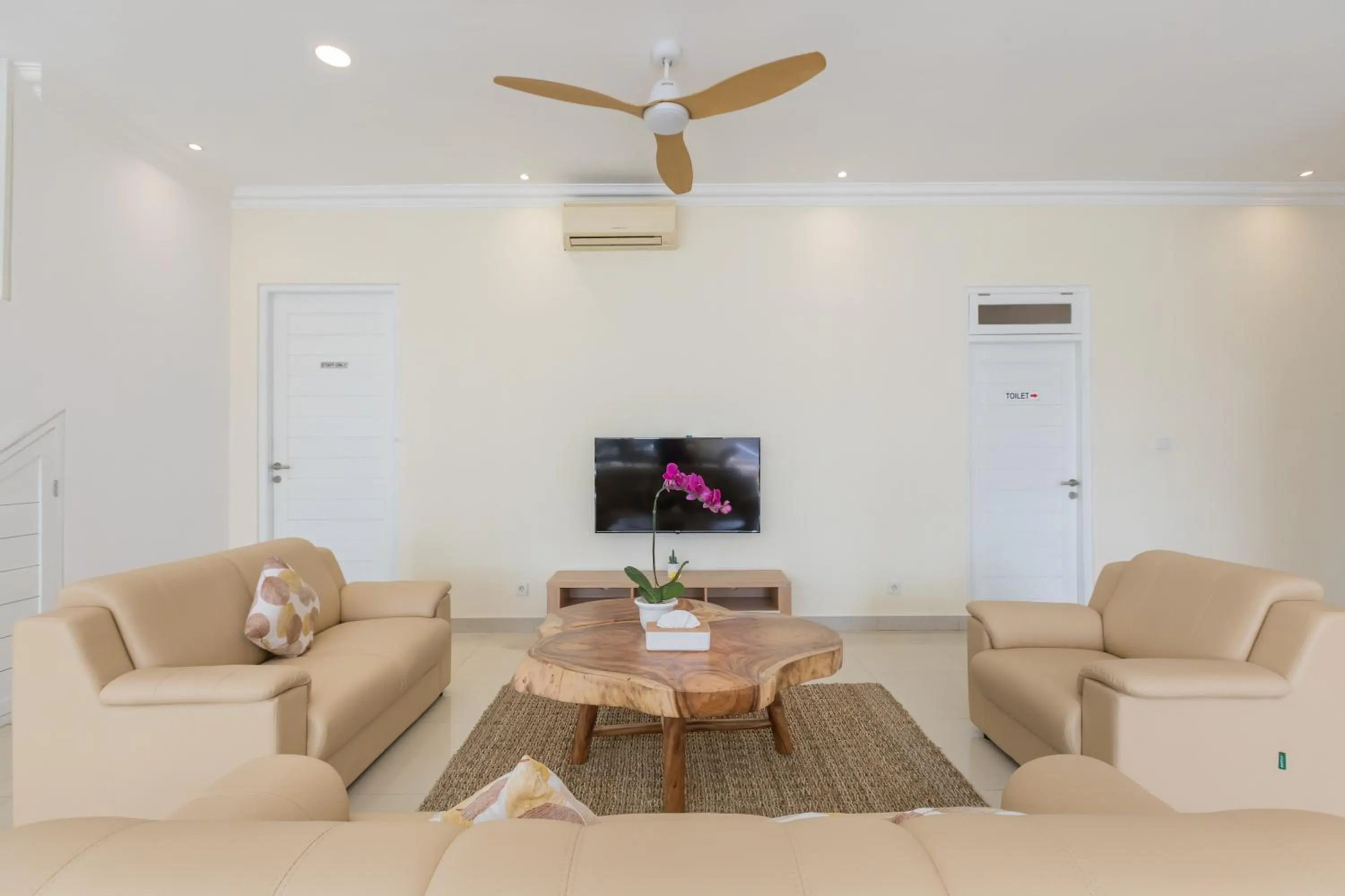 Communal lounge/ TV room in Villa Haka Jimbaran by Nagisa Bali