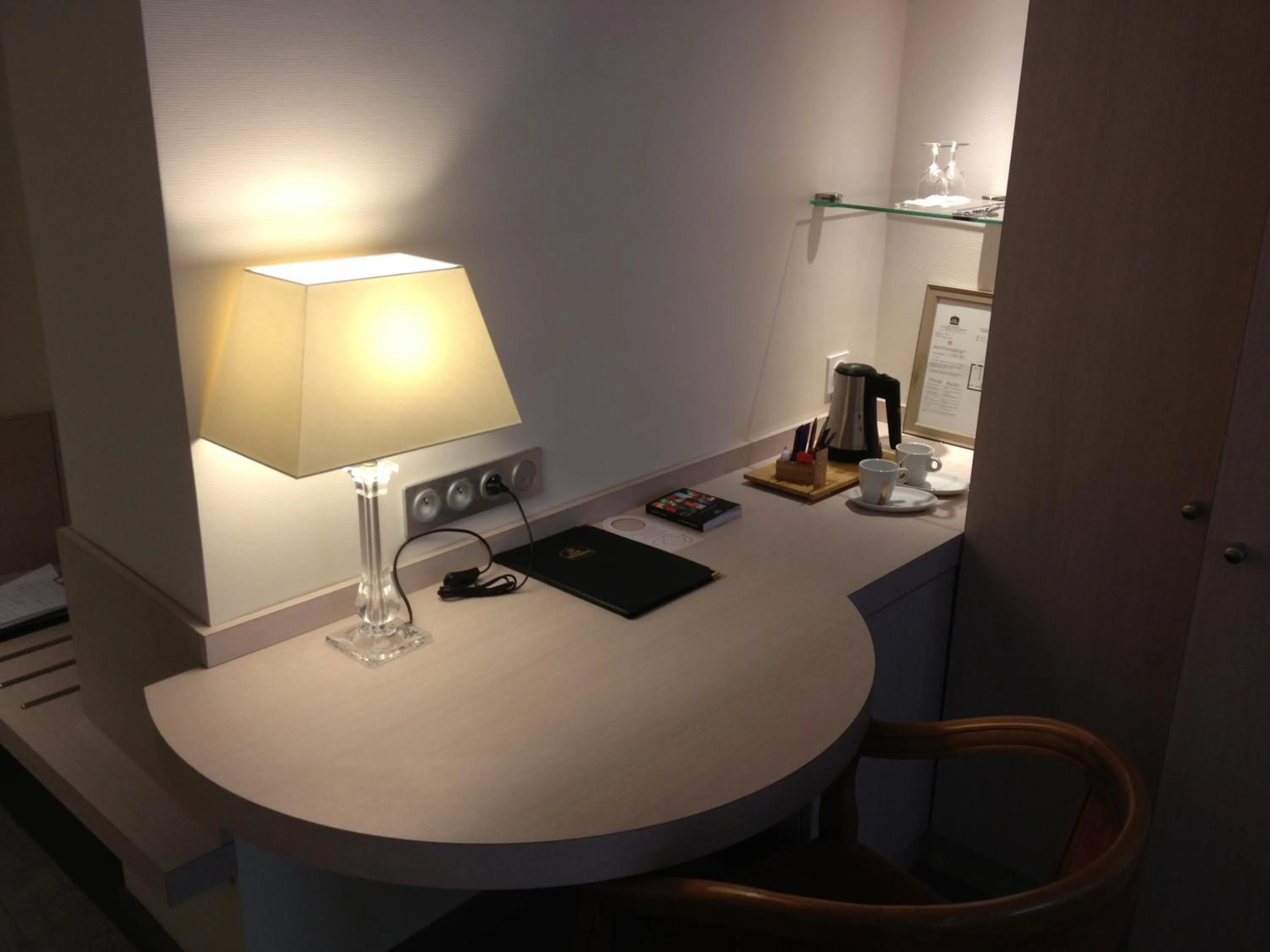 Seating area in Logis Hôtel Restaurant Le Dauphin et Le Spa du Prieuré