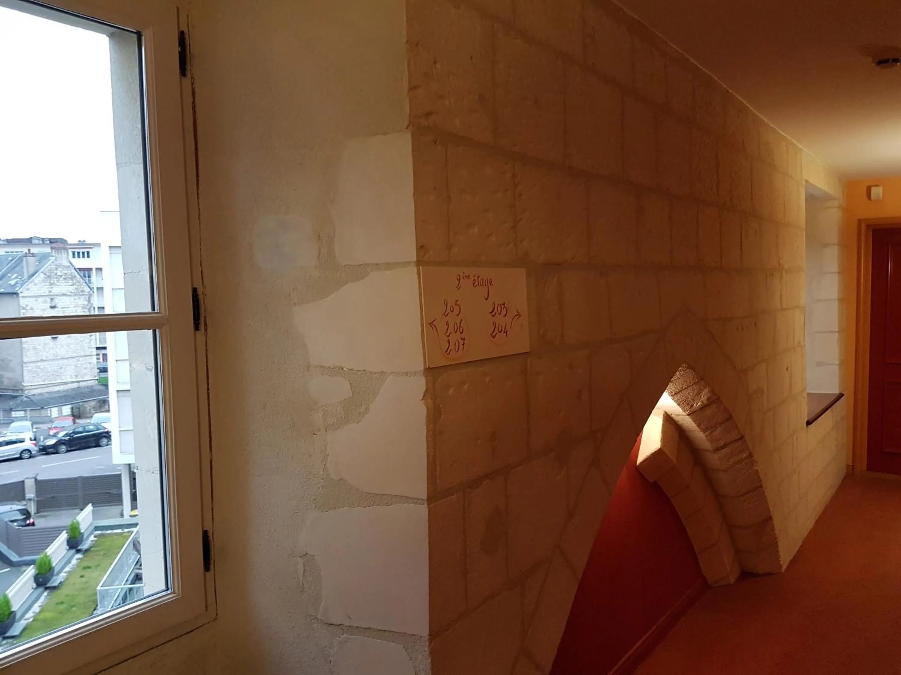 Property building in Logis Hôtel Restaurant Le Dauphin et Le Spa du Prieuré