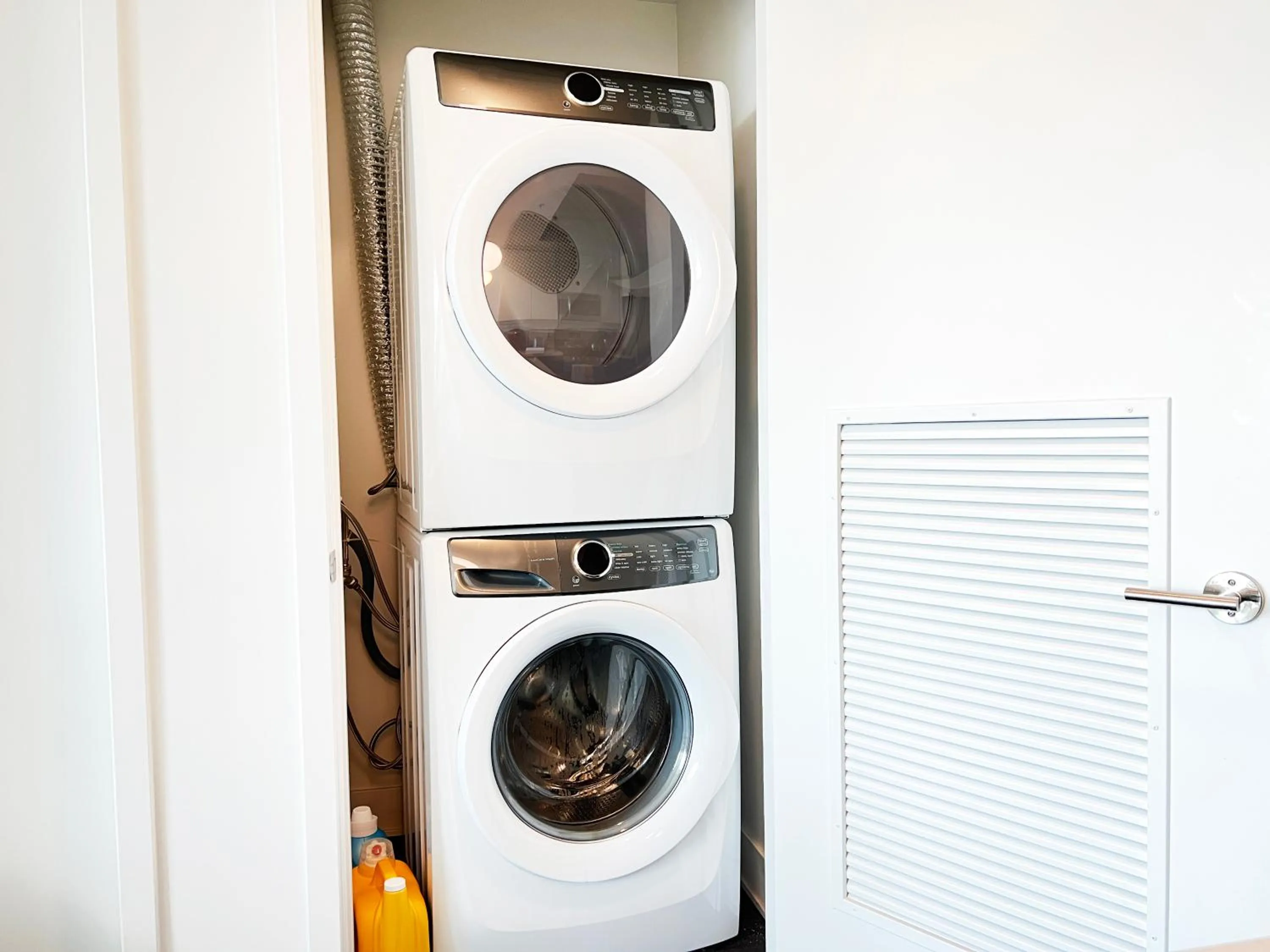 washing machine in Sky-Rise Apartments