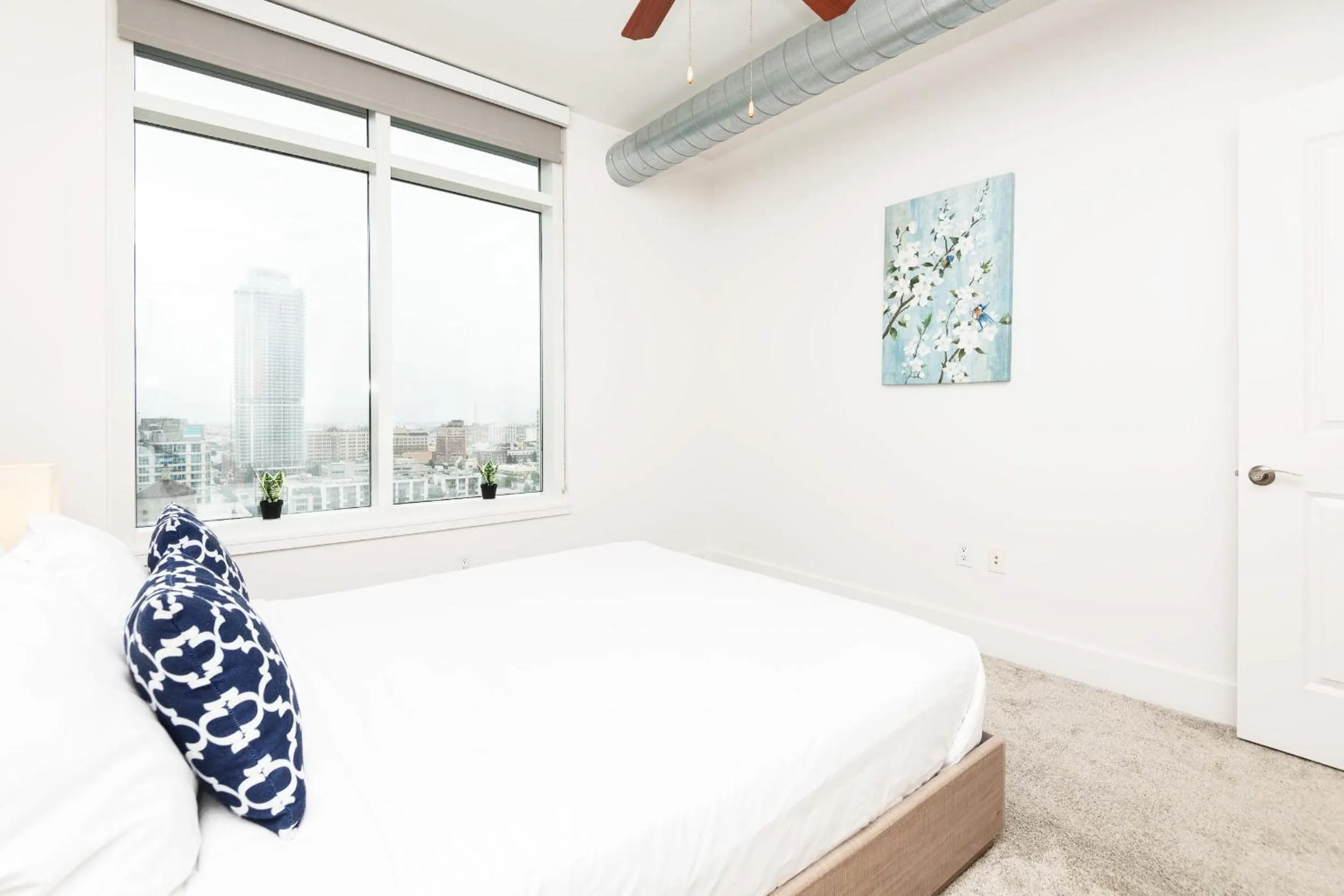 Bed in Sky-Rise Apartments