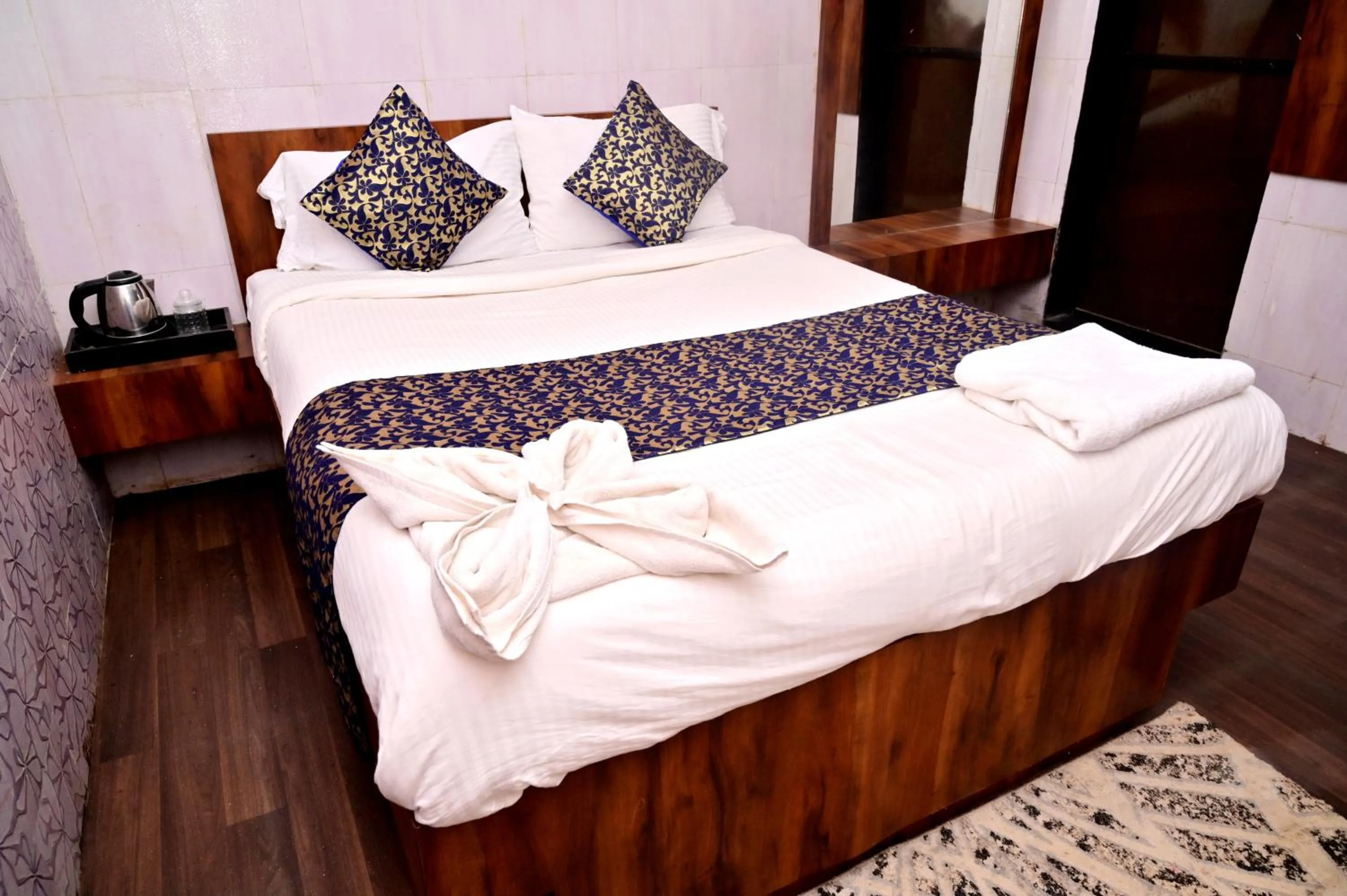 Bed in KK Tree Retreat Igatpuri