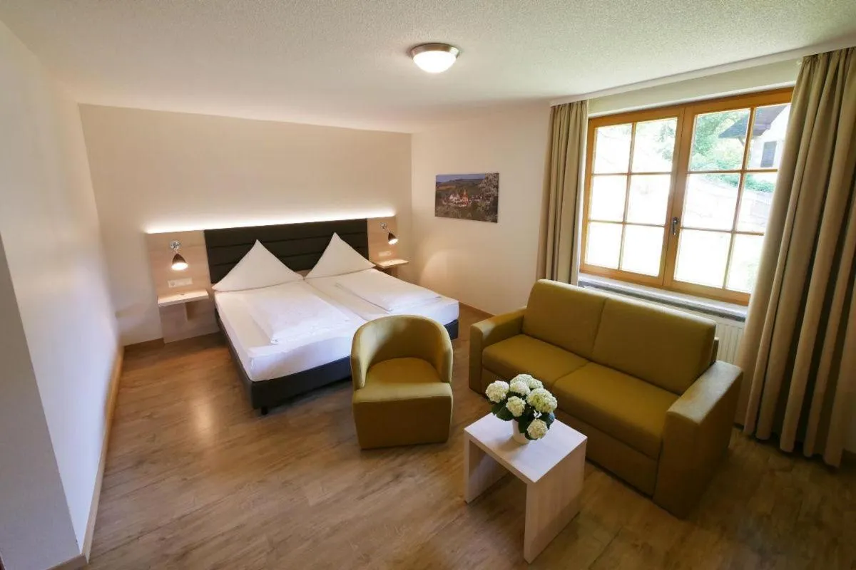 Photo of the whole room, Bed in Hotel-Restaurant Bibermühle GmbH