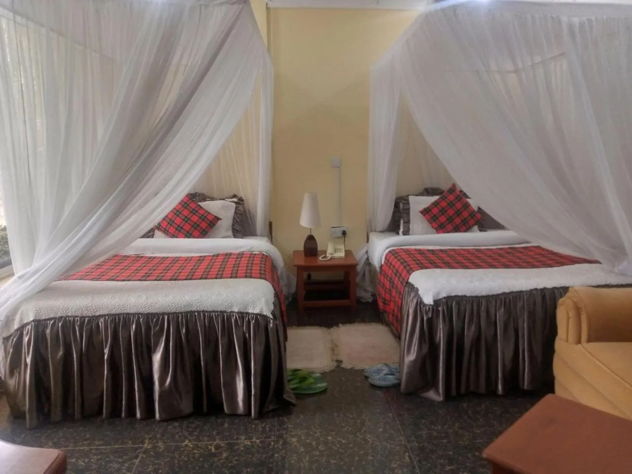 Bed in Karibu Heritage House