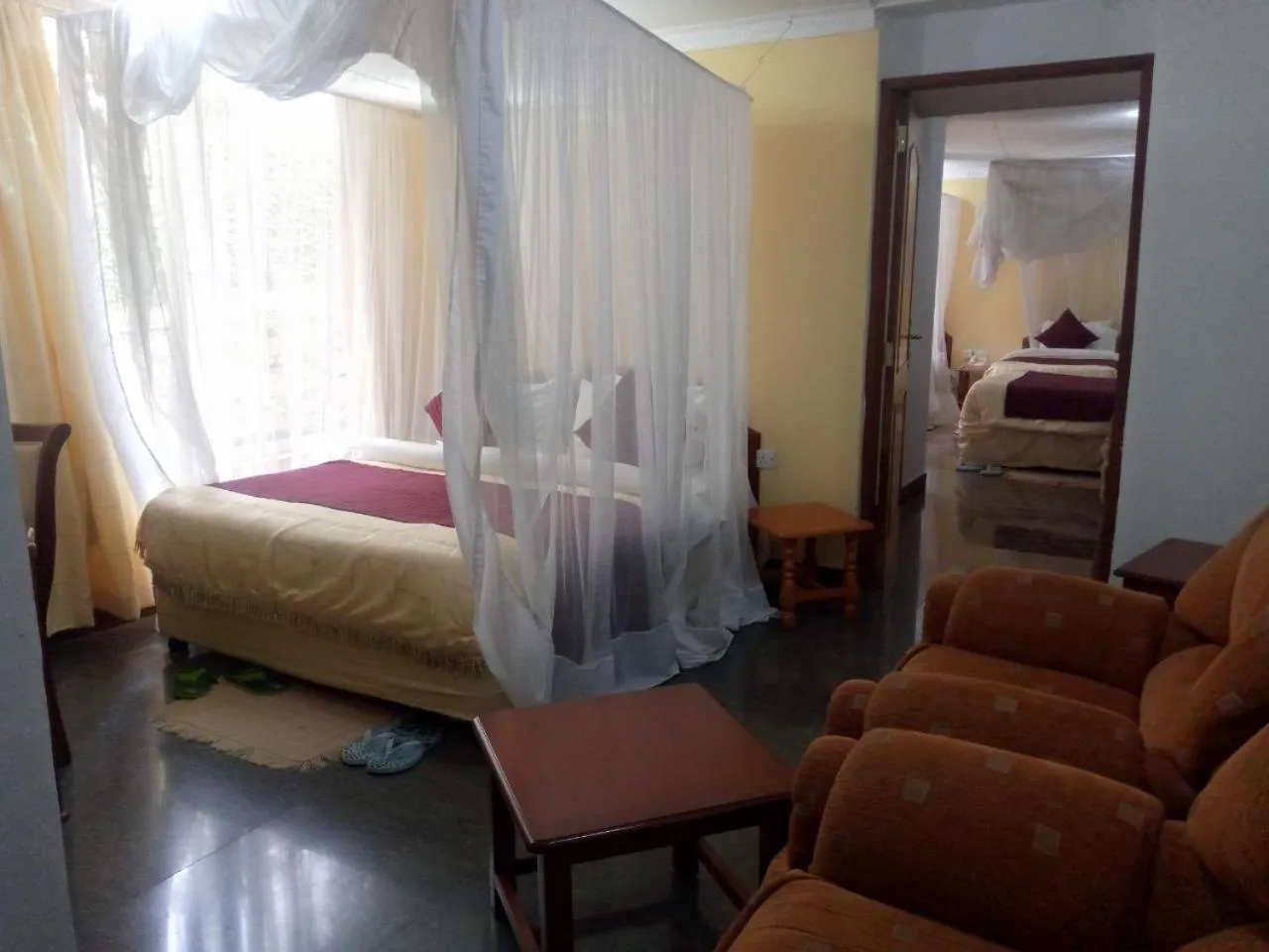 Bed in Karibu Heritage House