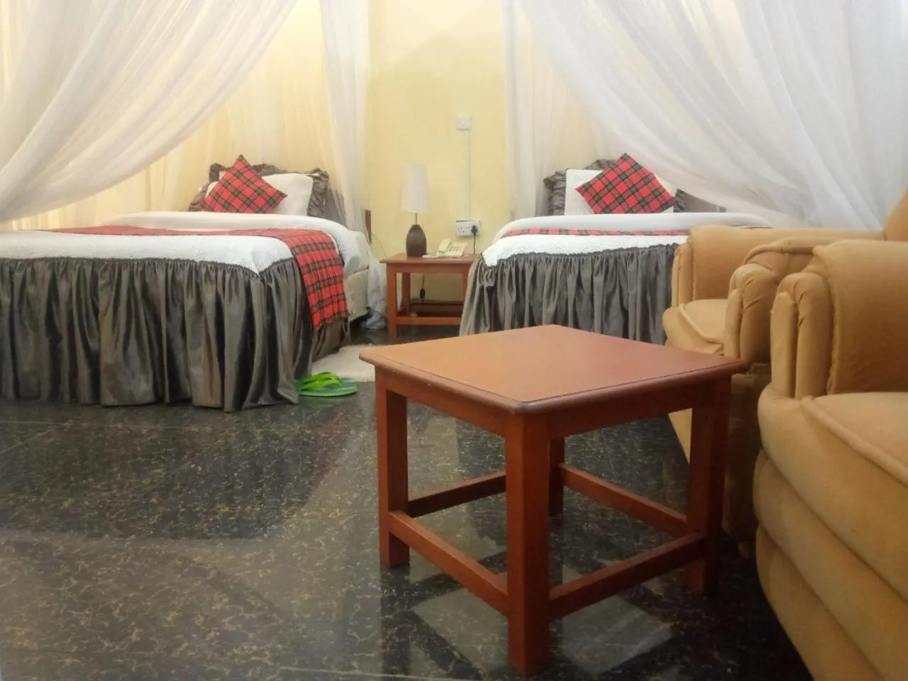 Bed in Karibu Heritage House