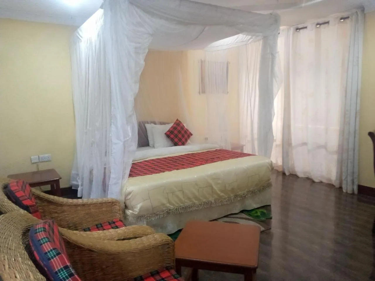 Bed in Karibu Heritage House