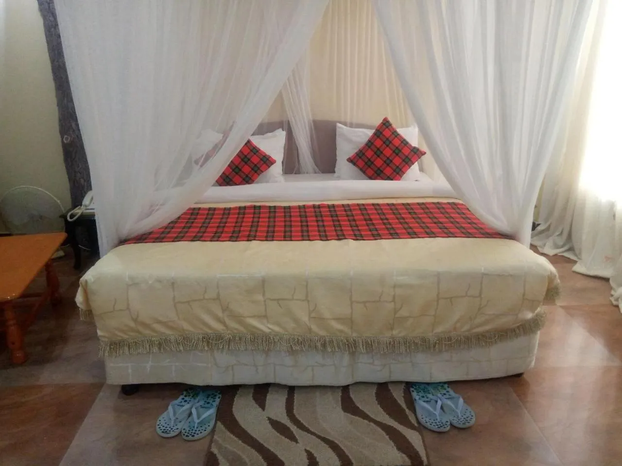 Bed in Karibu Heritage House