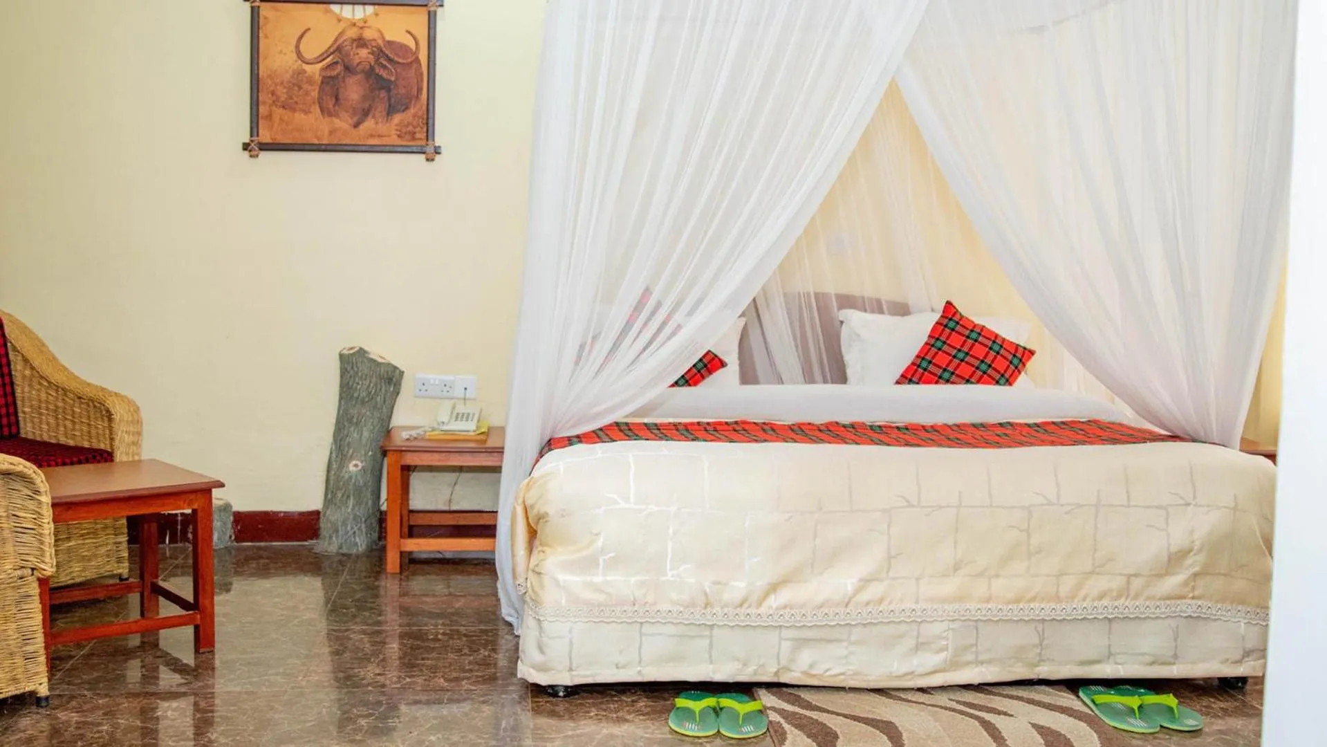 Bed in Karibu Heritage House