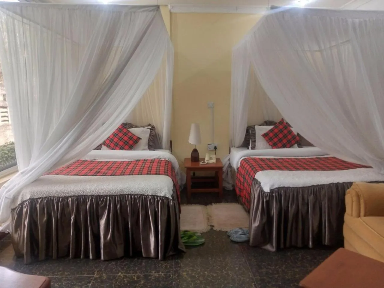 Bed in Karibu Heritage House