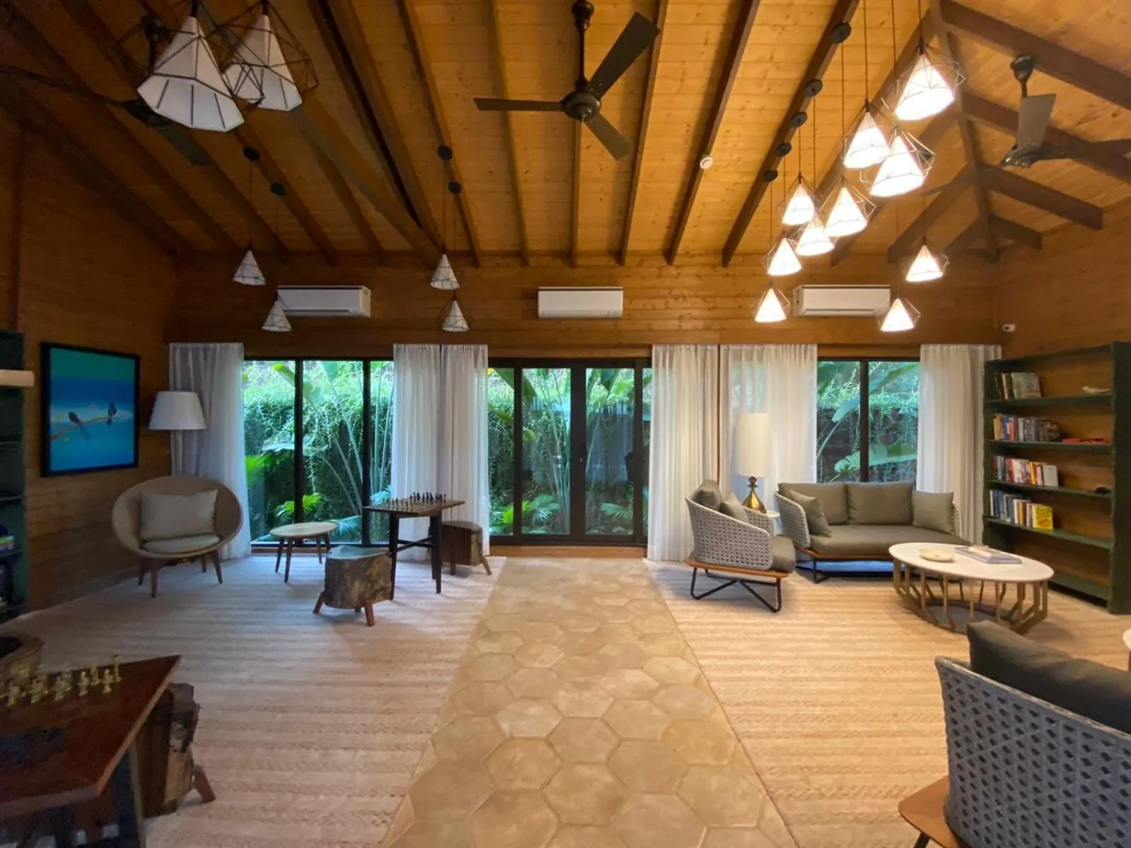 Communal lounge/ TV room in The Postcard Hideaway, Netravali Wildlife Sanctuary, Goa