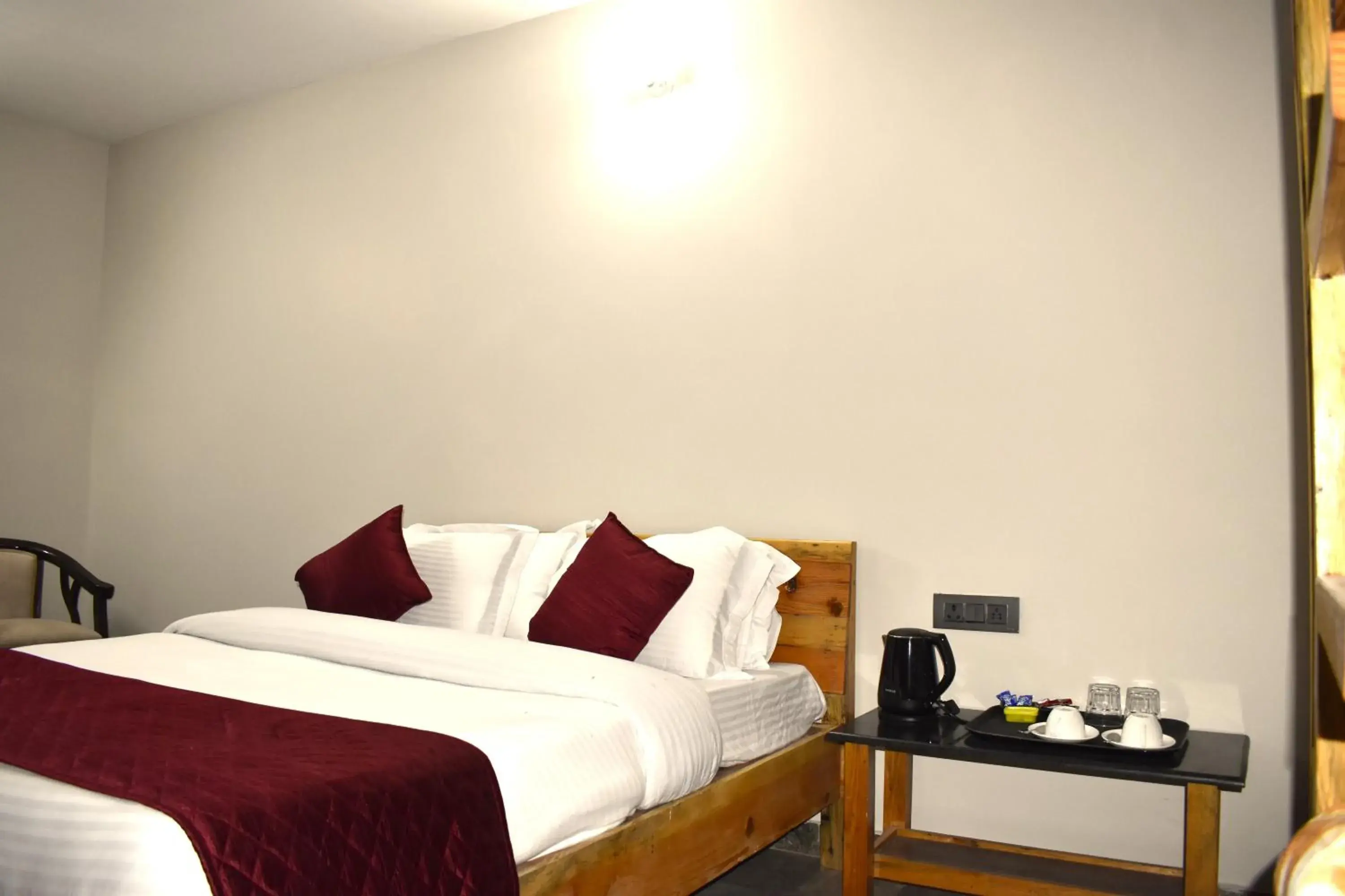 Bed in Captains Paradise Luxury Resort at Mukteshwar Hill Station Bed in Captains Paradise Luxury Resort at Mukteshwar Hill Station