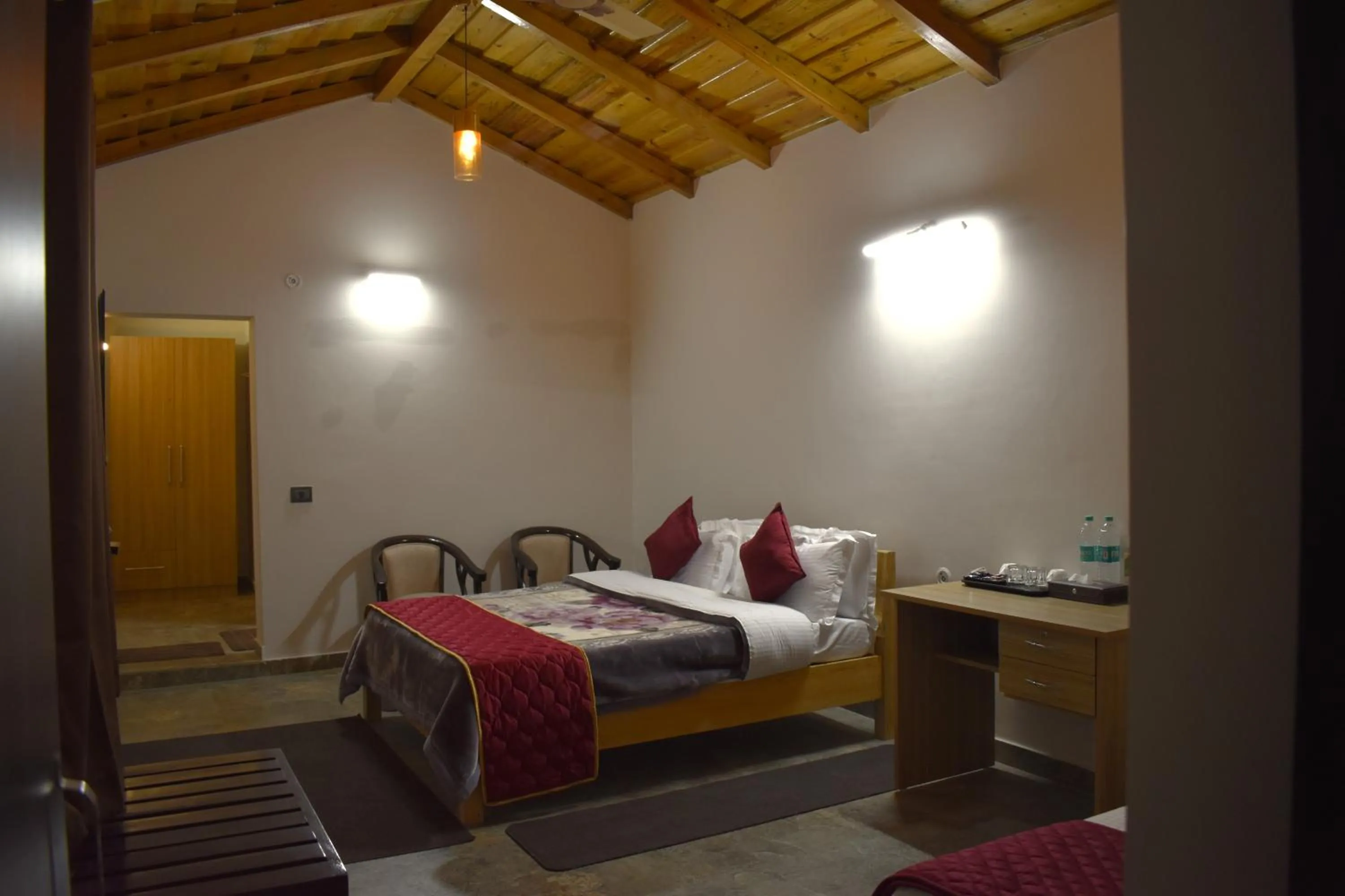 Bed in Captains Paradise Luxury Resort at Mukteshwar Hill Station