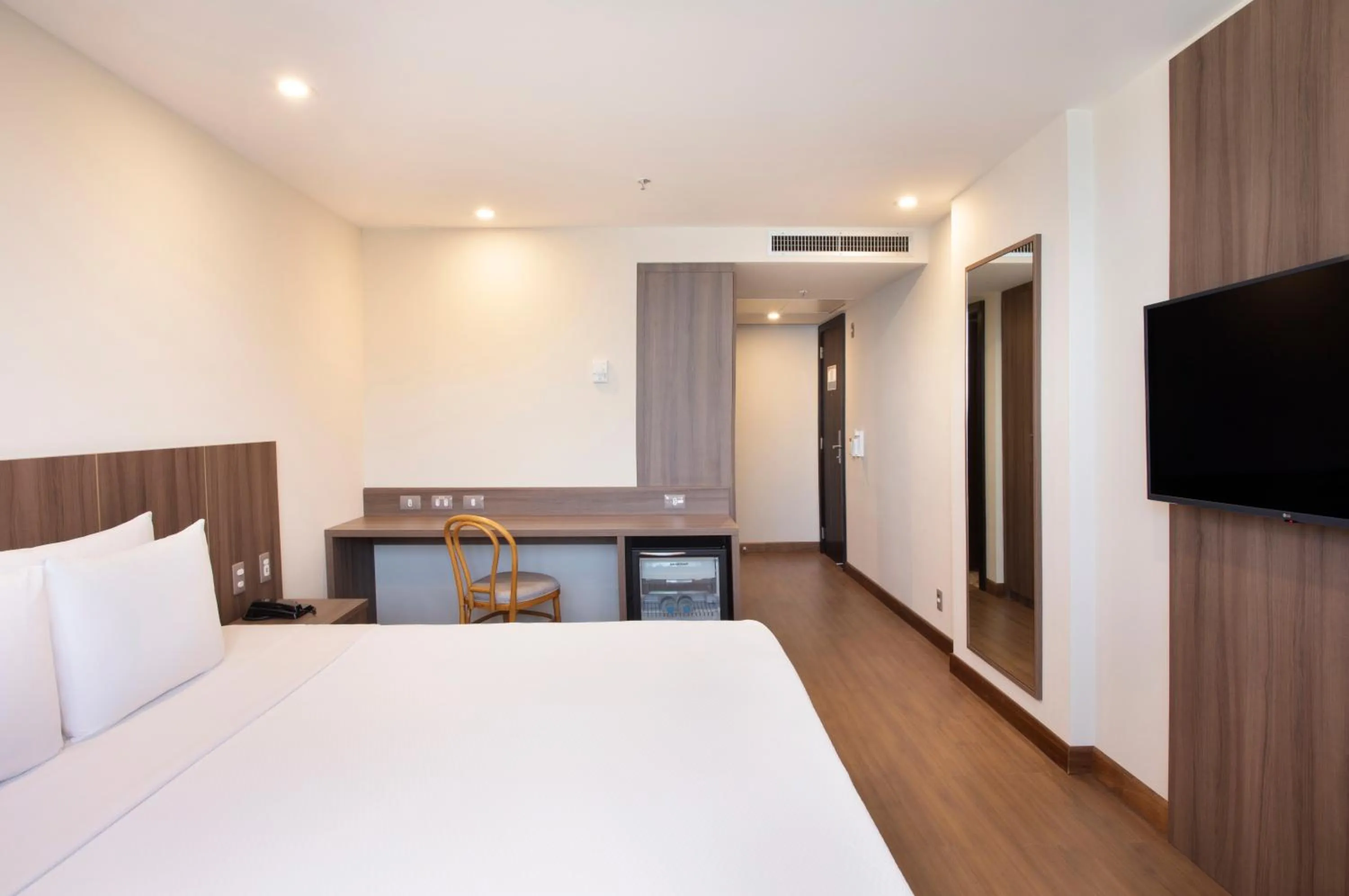 Bed in Windsor Tower Hotel