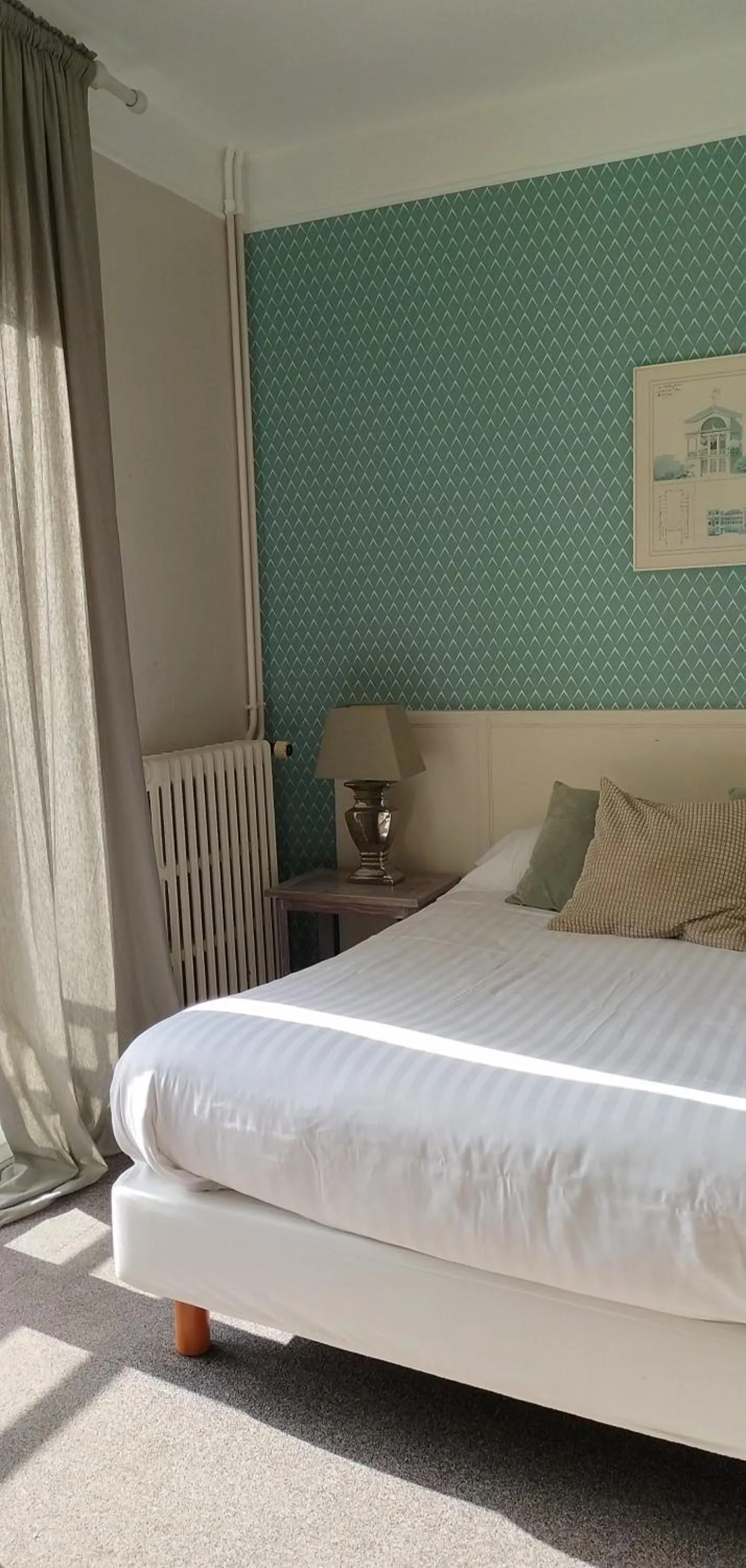 Bed in Hotel Le Rivage