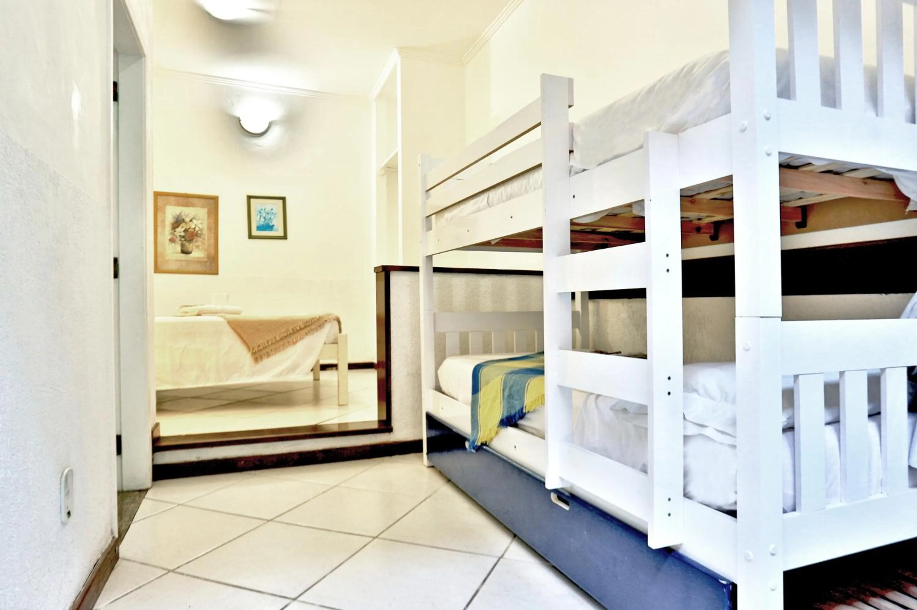 Bed in POUSADA AMENDOEIRA