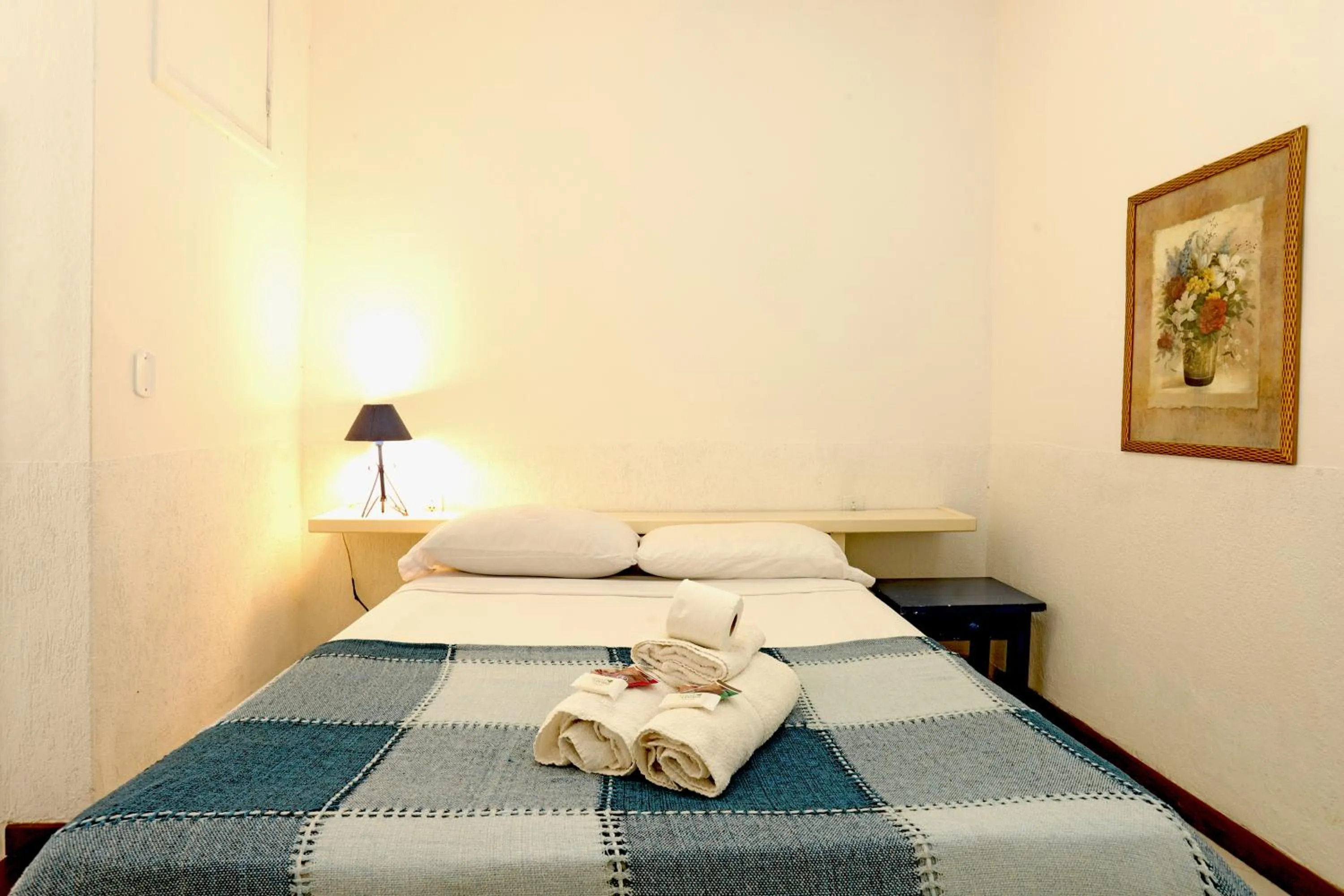 Bed in POUSADA AMENDOEIRA