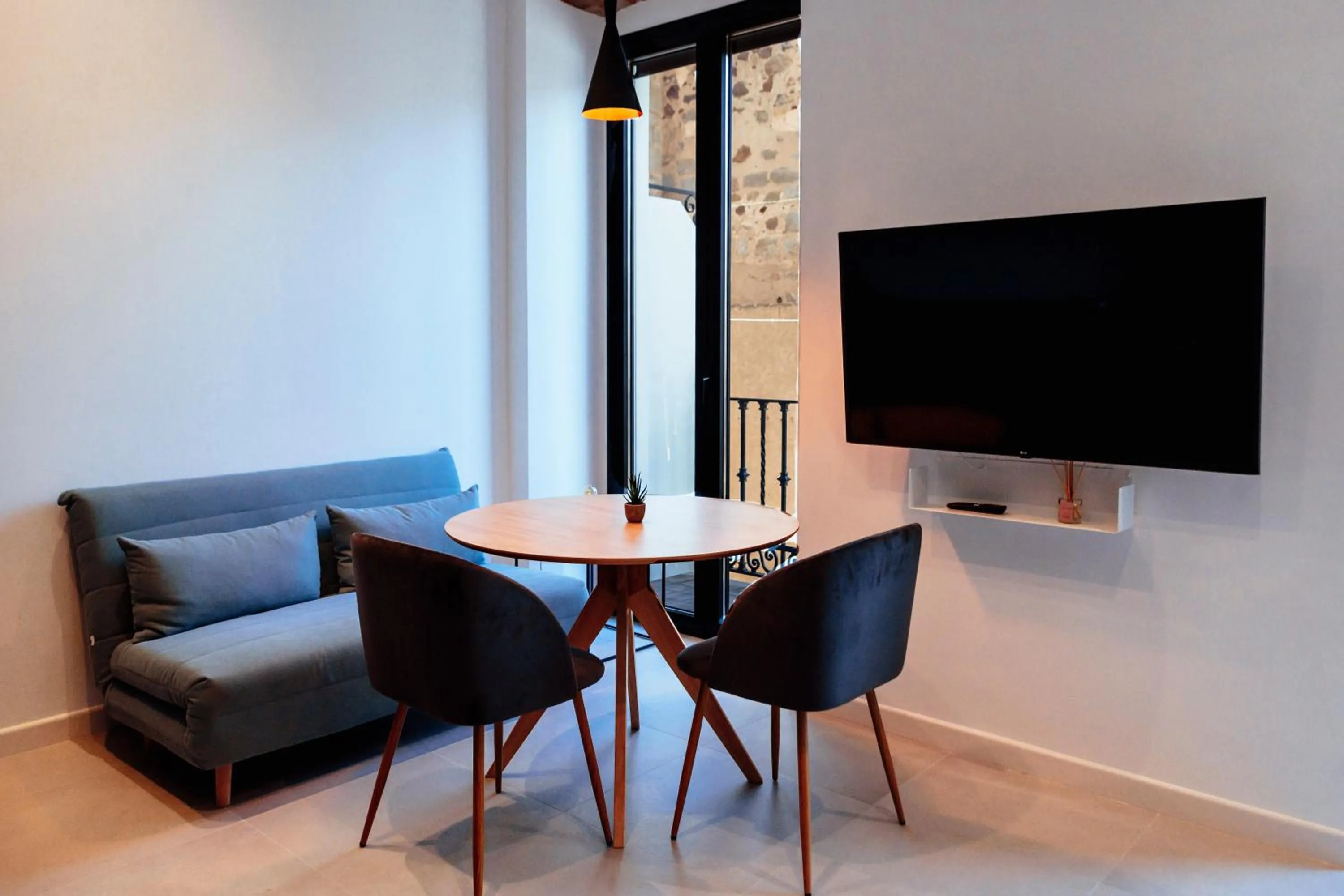 Seating area in Apartamentos Plaza de España 6