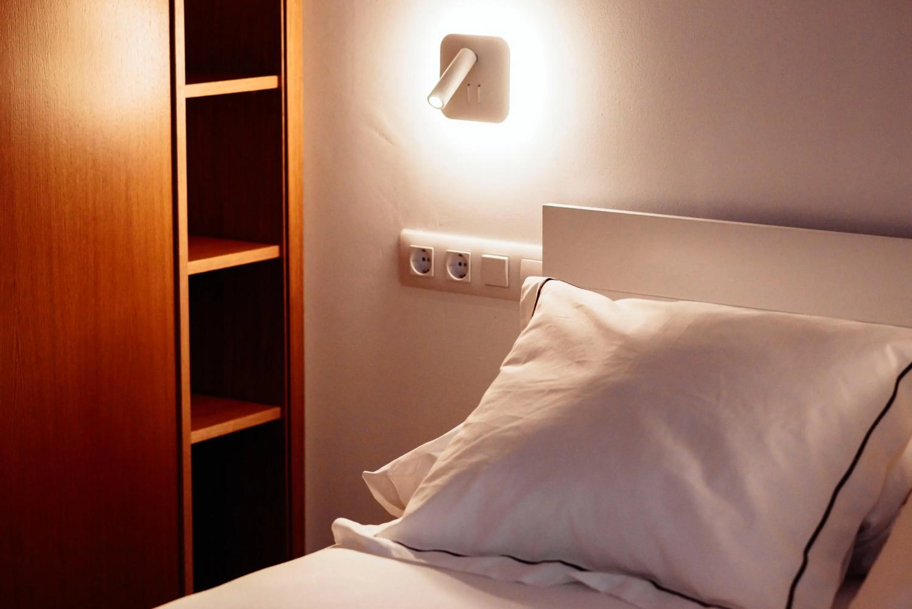 Bed in Apartamentos Plaza de España 6