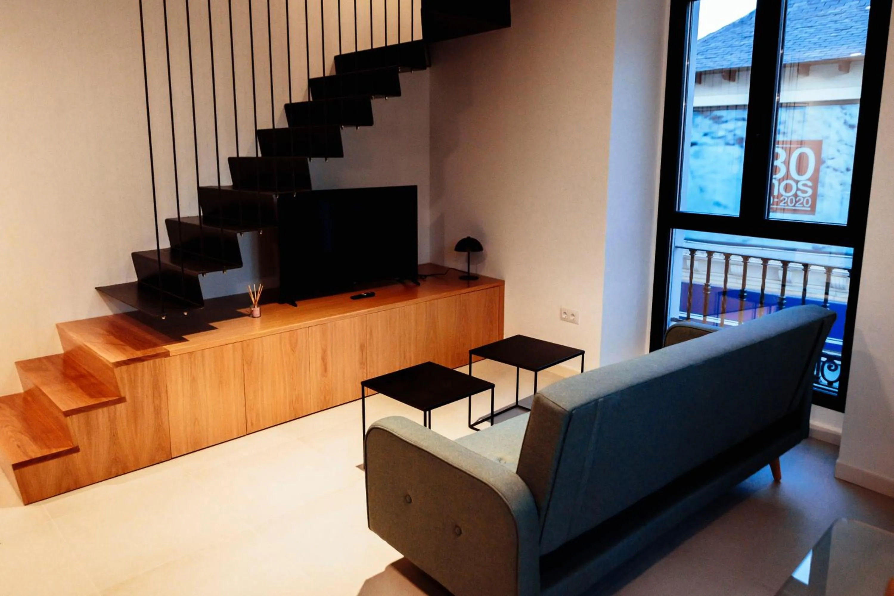 Communal lounge/ TV room in Apartamentos Plaza de España 6