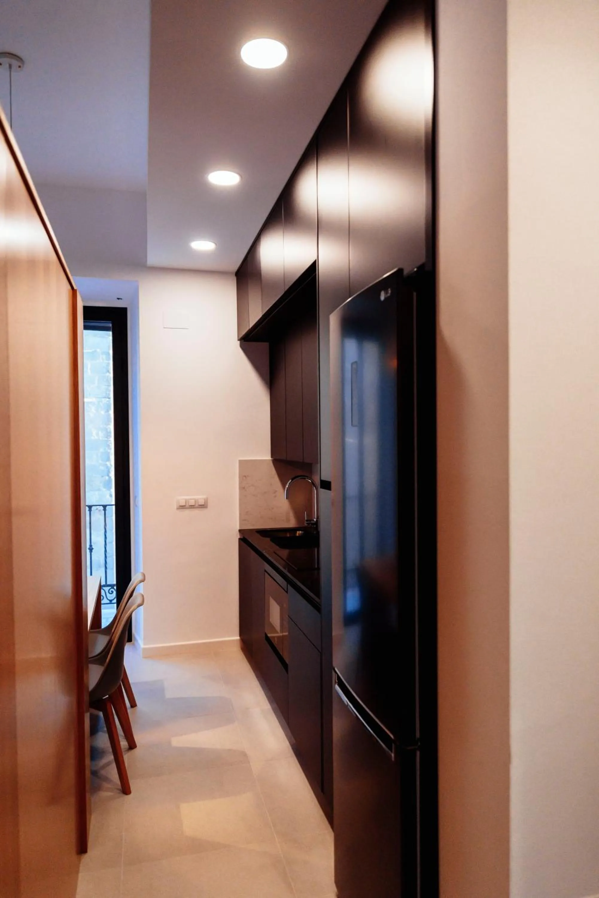 Kitchen or kitchenette in Apartamentos Plaza de España 6