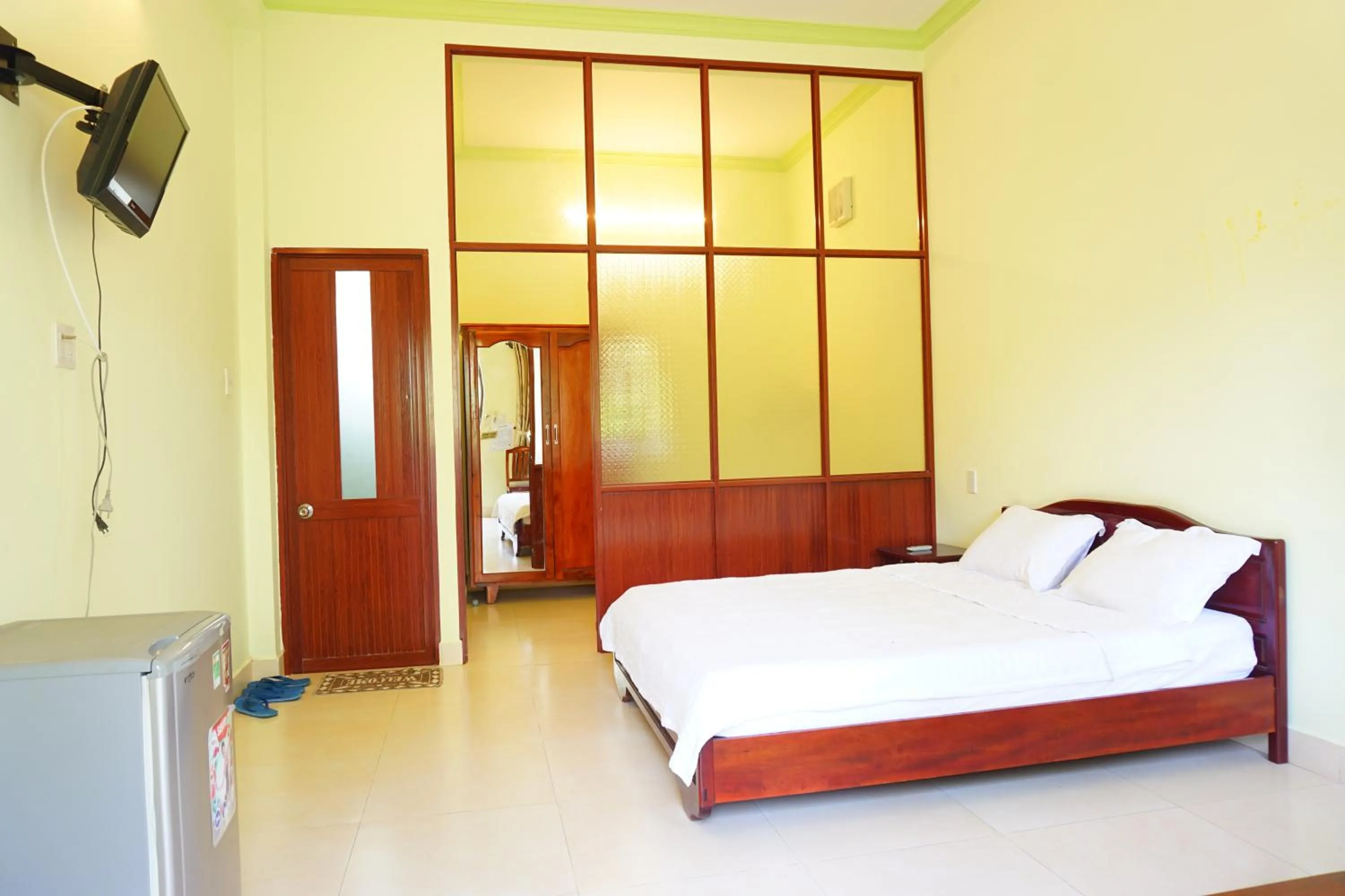 Bed in Cat Tien Guesthouse