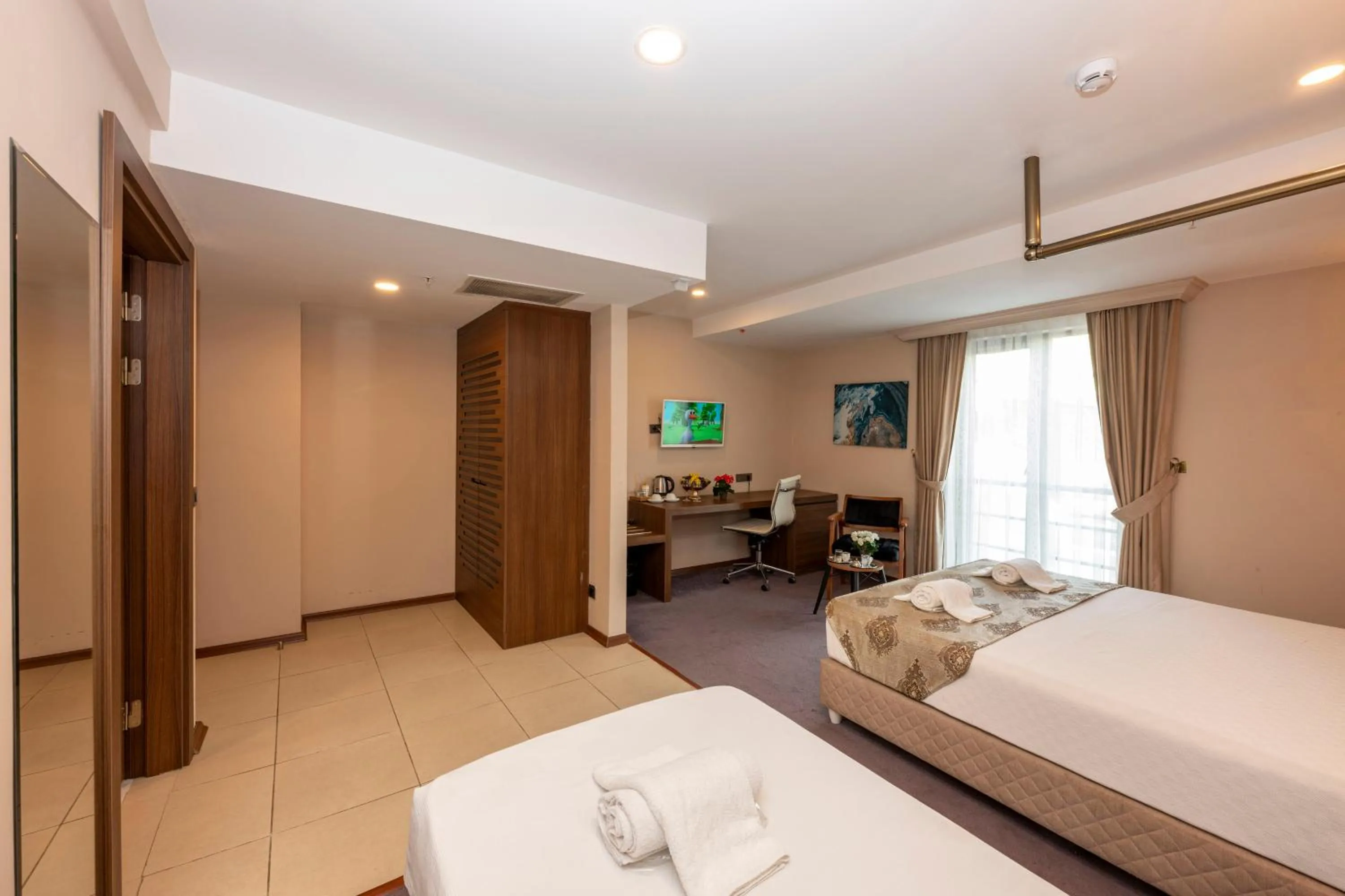 Bed in Litros Hotel & Spa