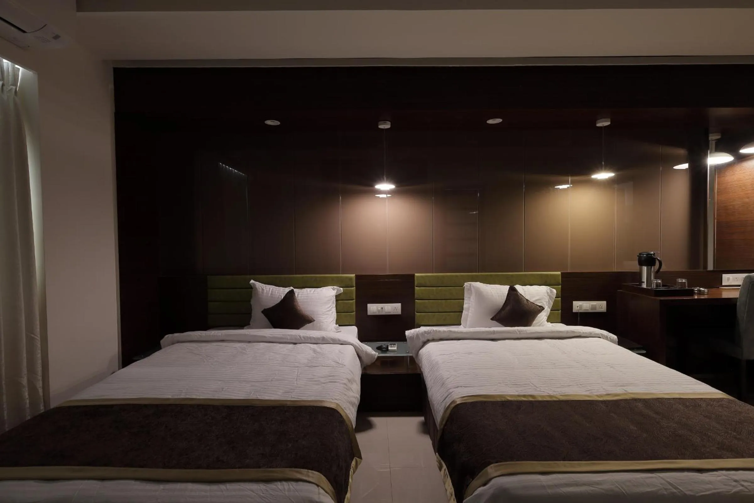 Bed in HOTEL THE LOTUS PARK