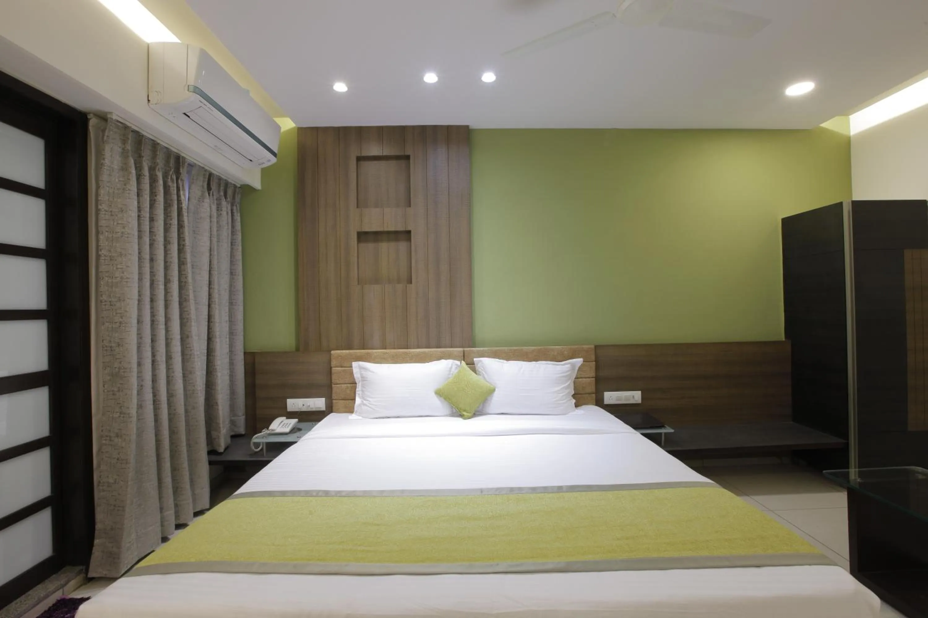 Bed in HOTEL THE LOTUS PARK