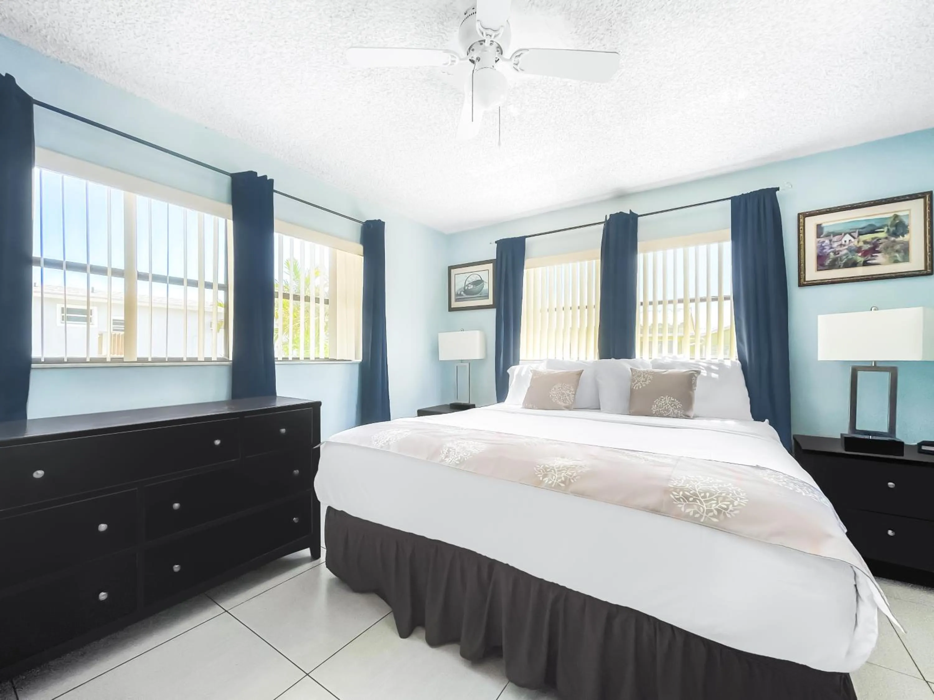 Bed in Neptune Oceanfront Rentals